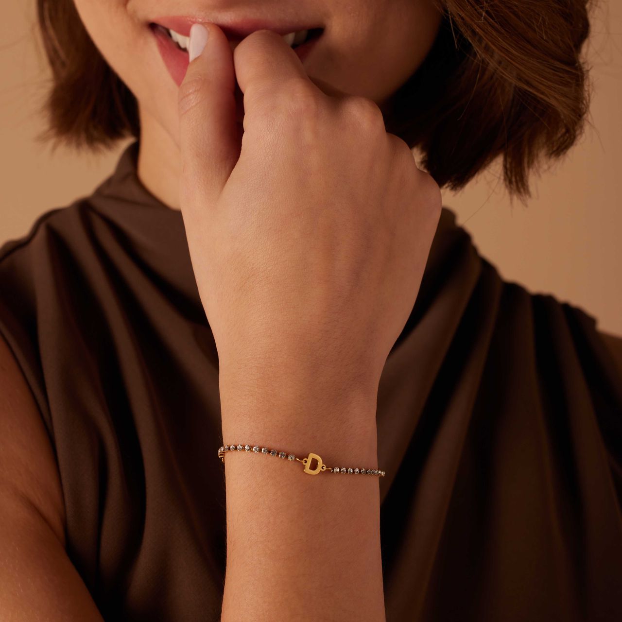 Stalen goldplated fantasiearmband met letterhanger D met zirkonia voor dames