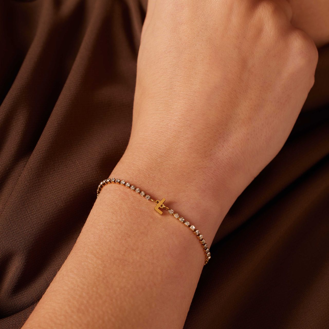 Stainless steel goldplated tennis armband wit cz letter - L