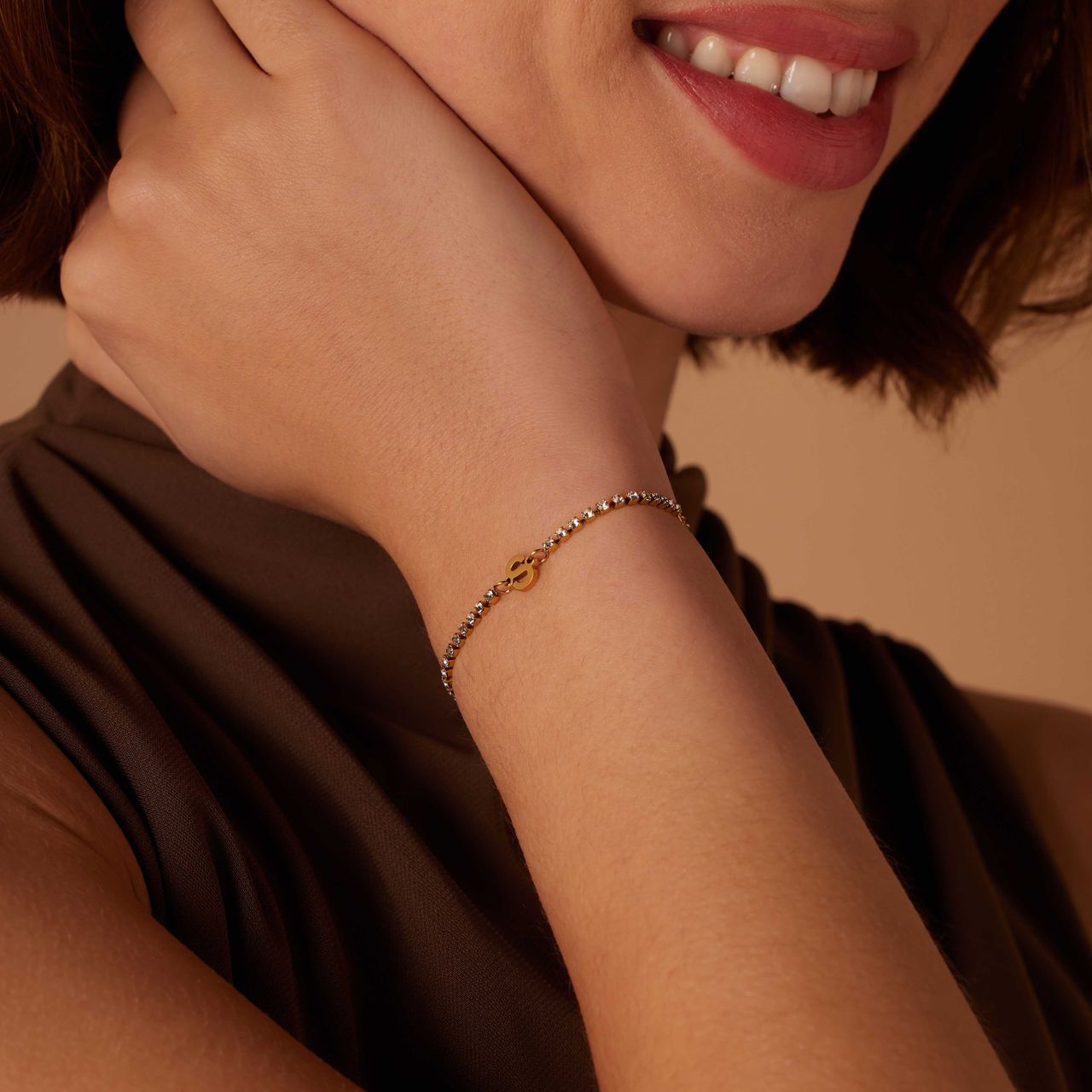 Stalen goldplated tennis armband wit cz letter - S