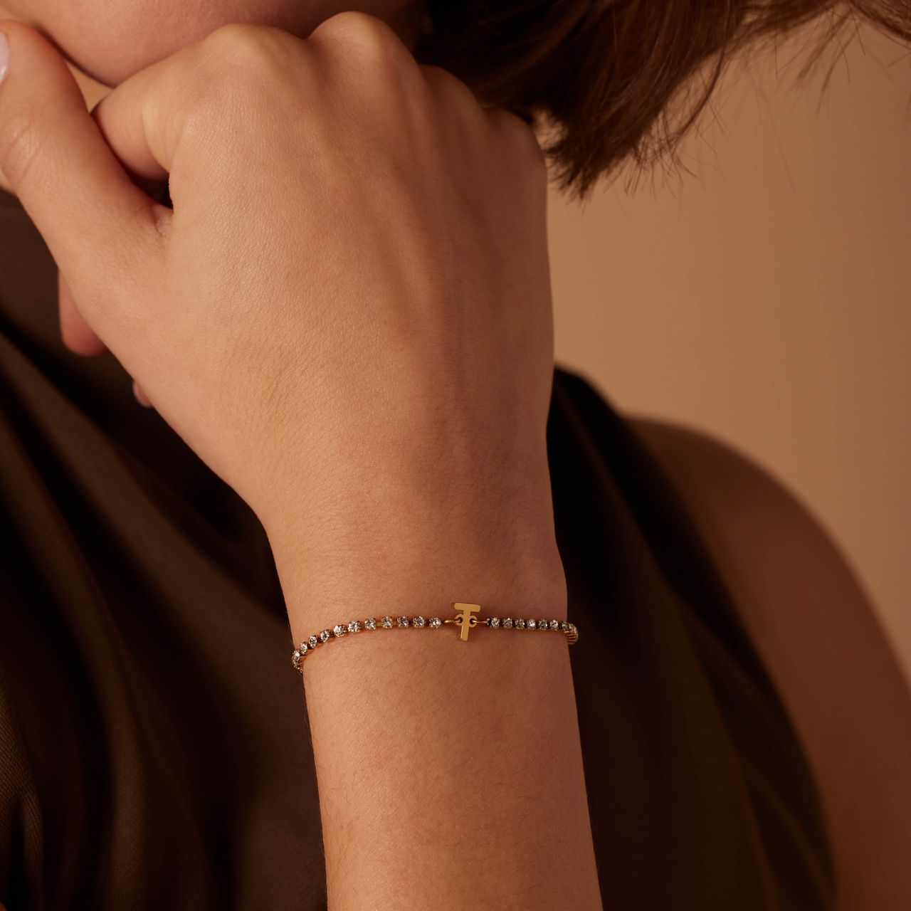 Stalen goldplated fantasiearmband met letterhanger T met zirkonia voor dames