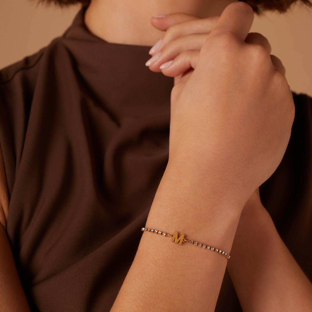 Stalen goldplated tennis armband wit cz letter - W