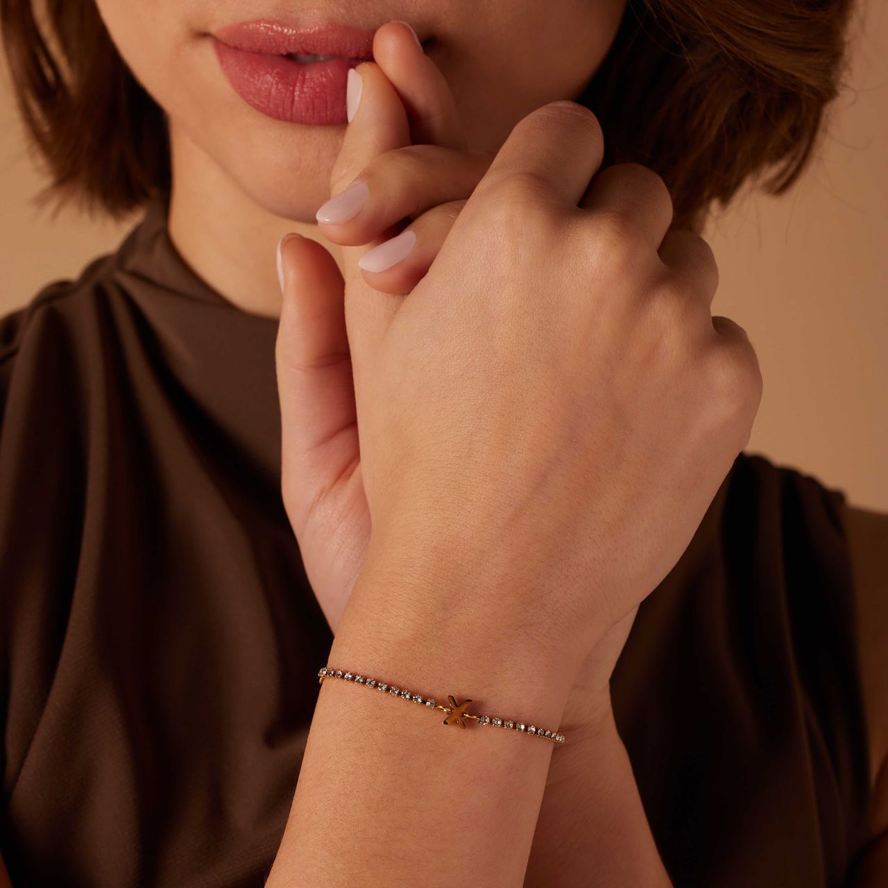 Stalen goldplated fantasiearmband met letterhanger X met zirkonia voor dames