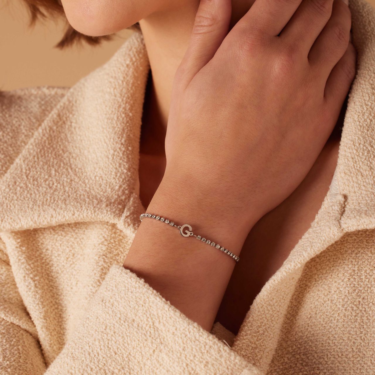 Stalen tennis armband wit cz letter - G
