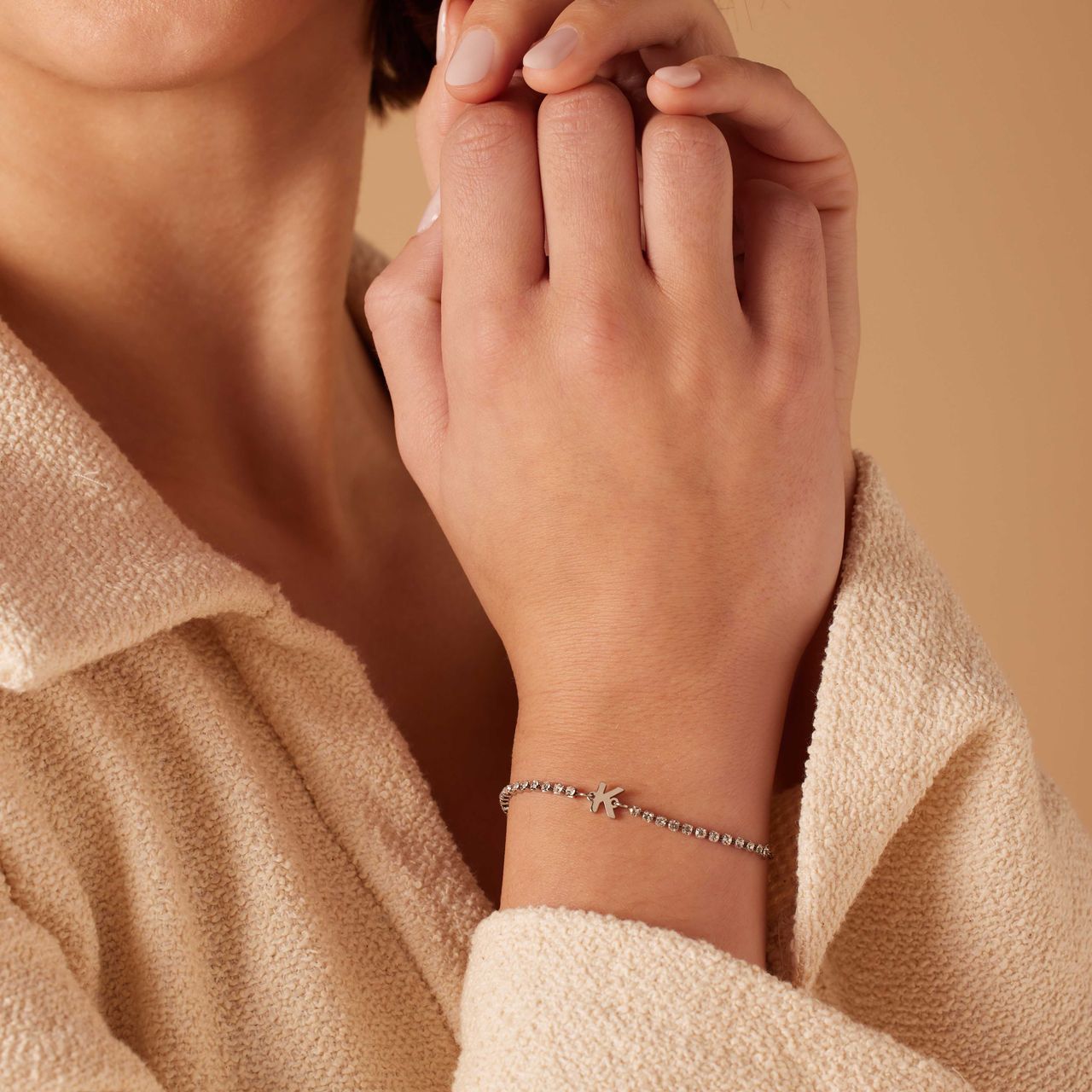 Stalen tennis armband wit cz letter - K