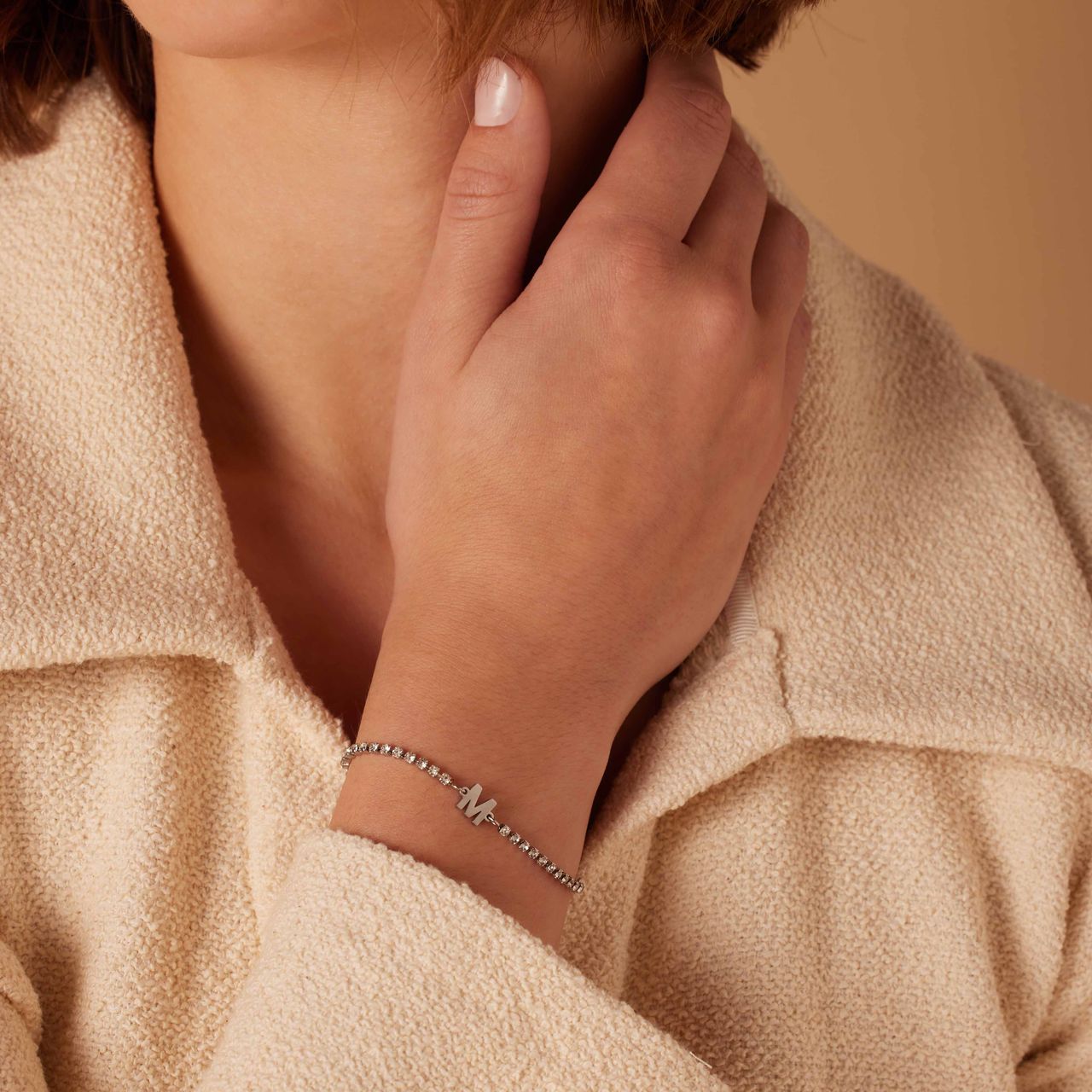 Stalen tennis armband wit cz letter - M