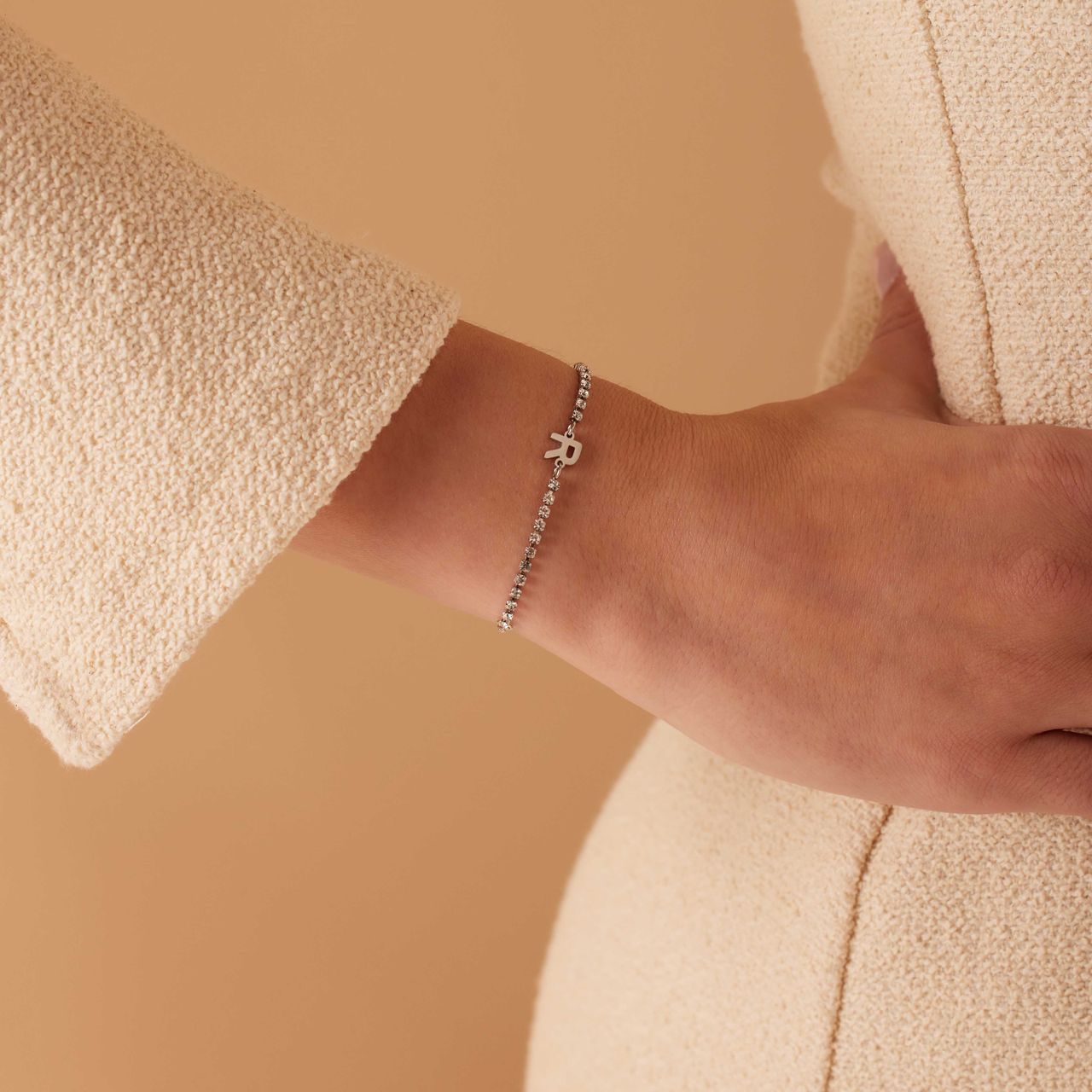 Stainless steel tennis armband wit cz letter - R