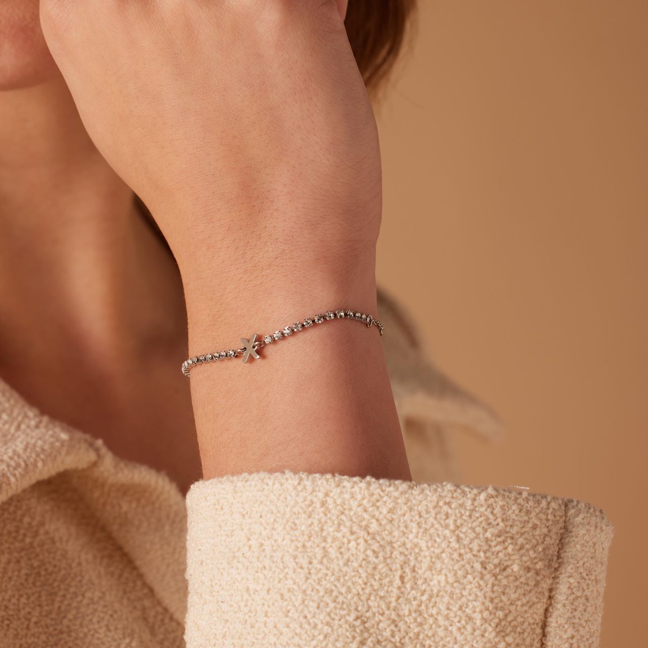 Stalen tennis armband wit cz letter - X