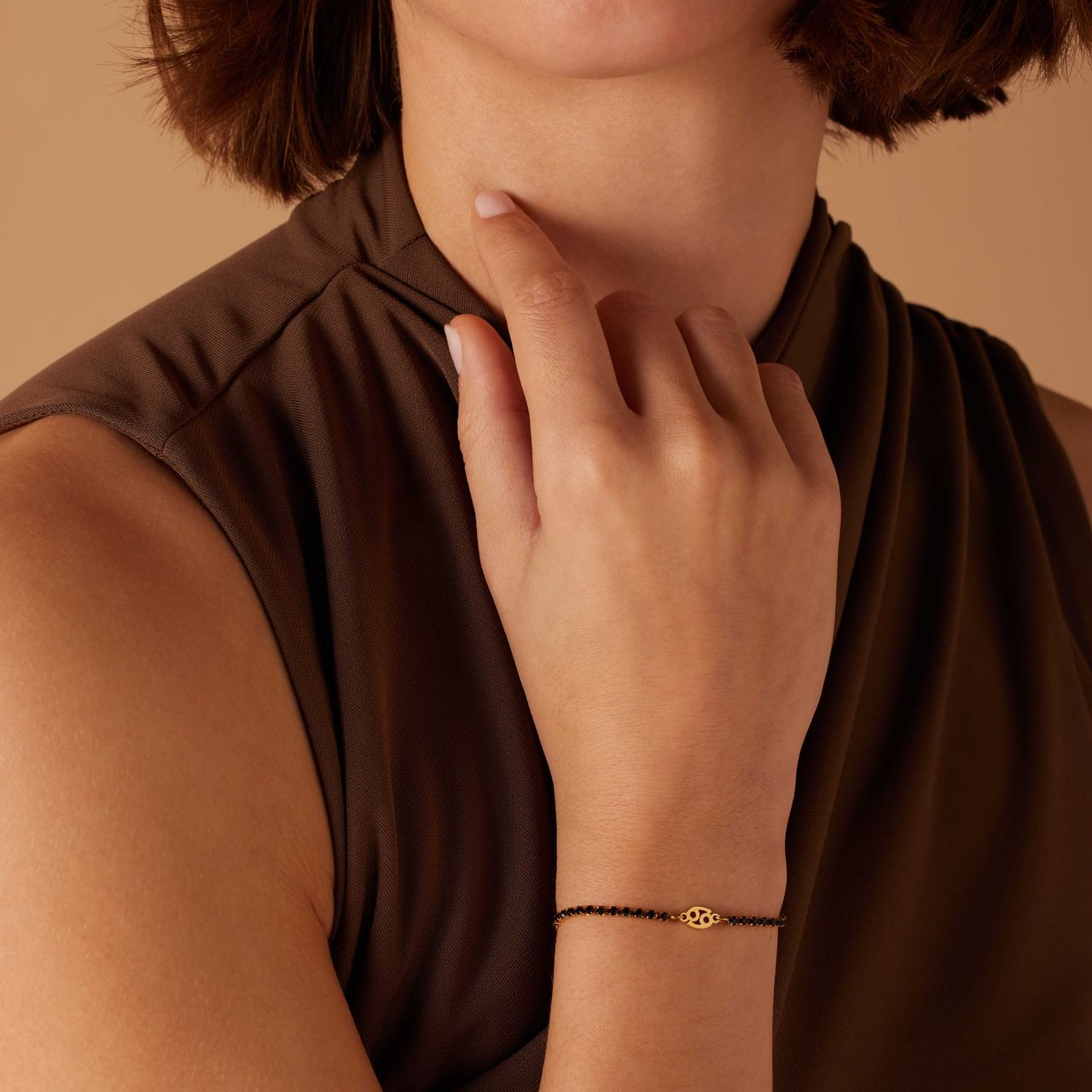 Stainless steel goldplated fantasiearmband met sterrenbeeldhanger Kreeft met zirkonia voor dames