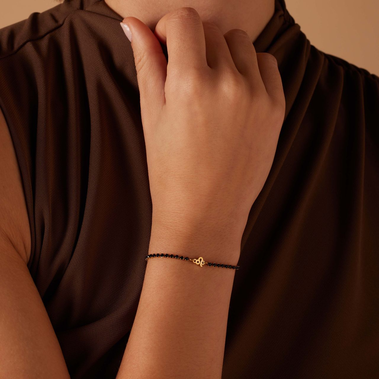 Stalen goldplated fantasiearmband met sterrenbeeldhanger Leeuw met zirkonia voor dames