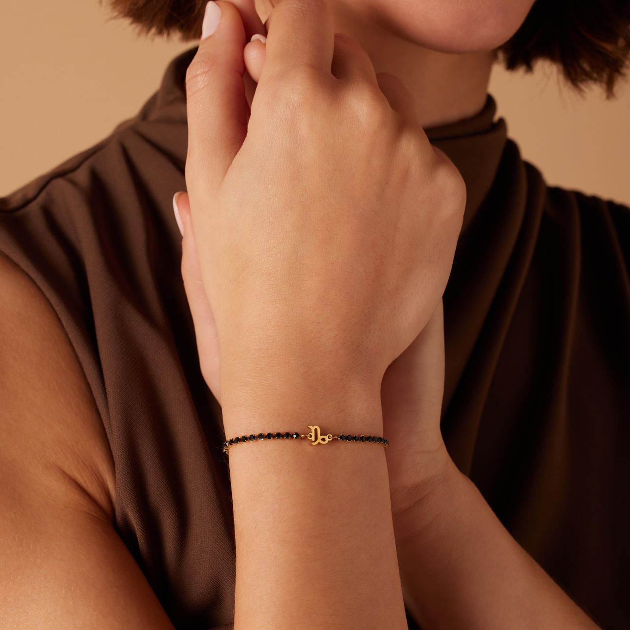 Stalen goldplated fantasiearmband met sterrenbeeld Steenbok met zirkonia voor dames