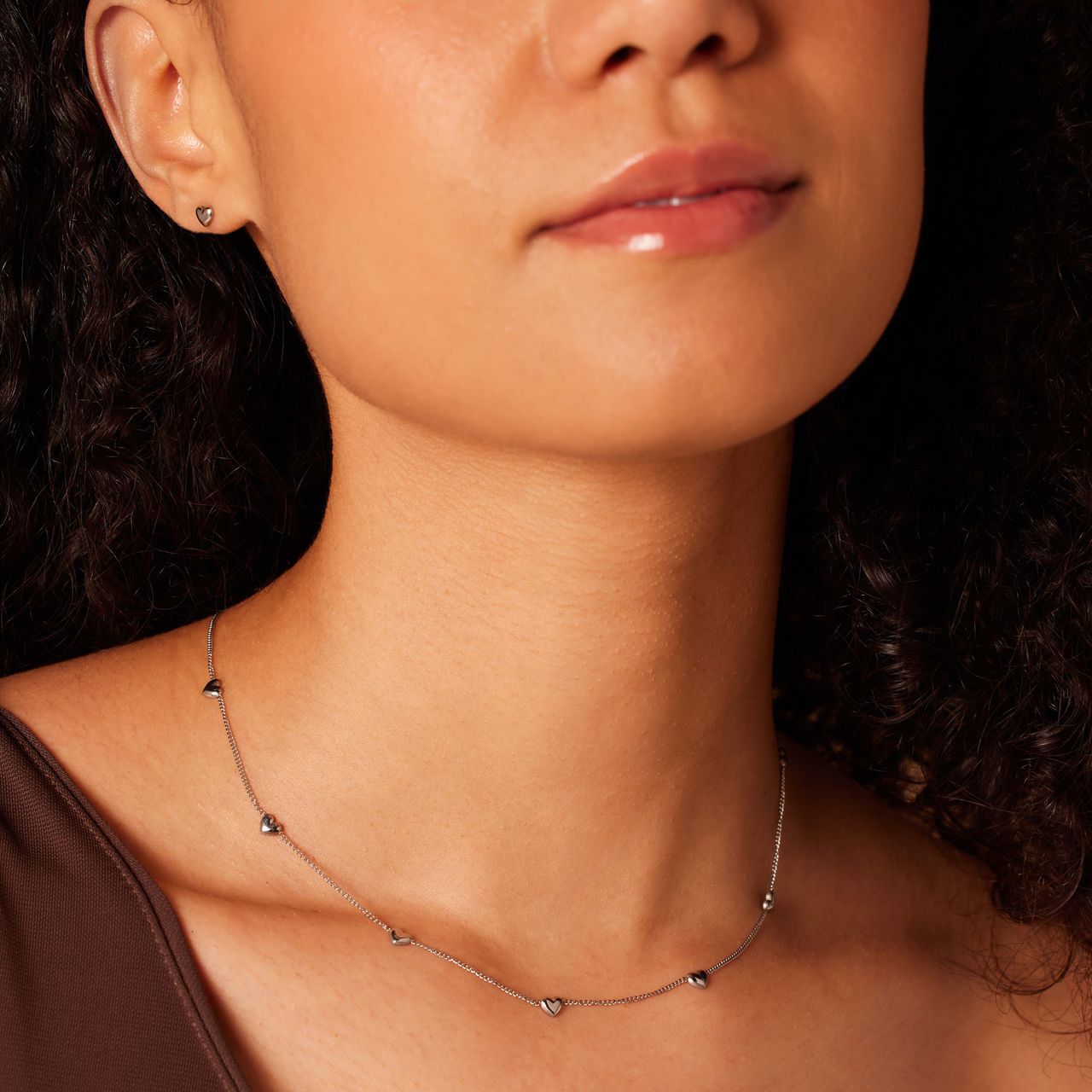 Stalen ketting met 7 hartjes