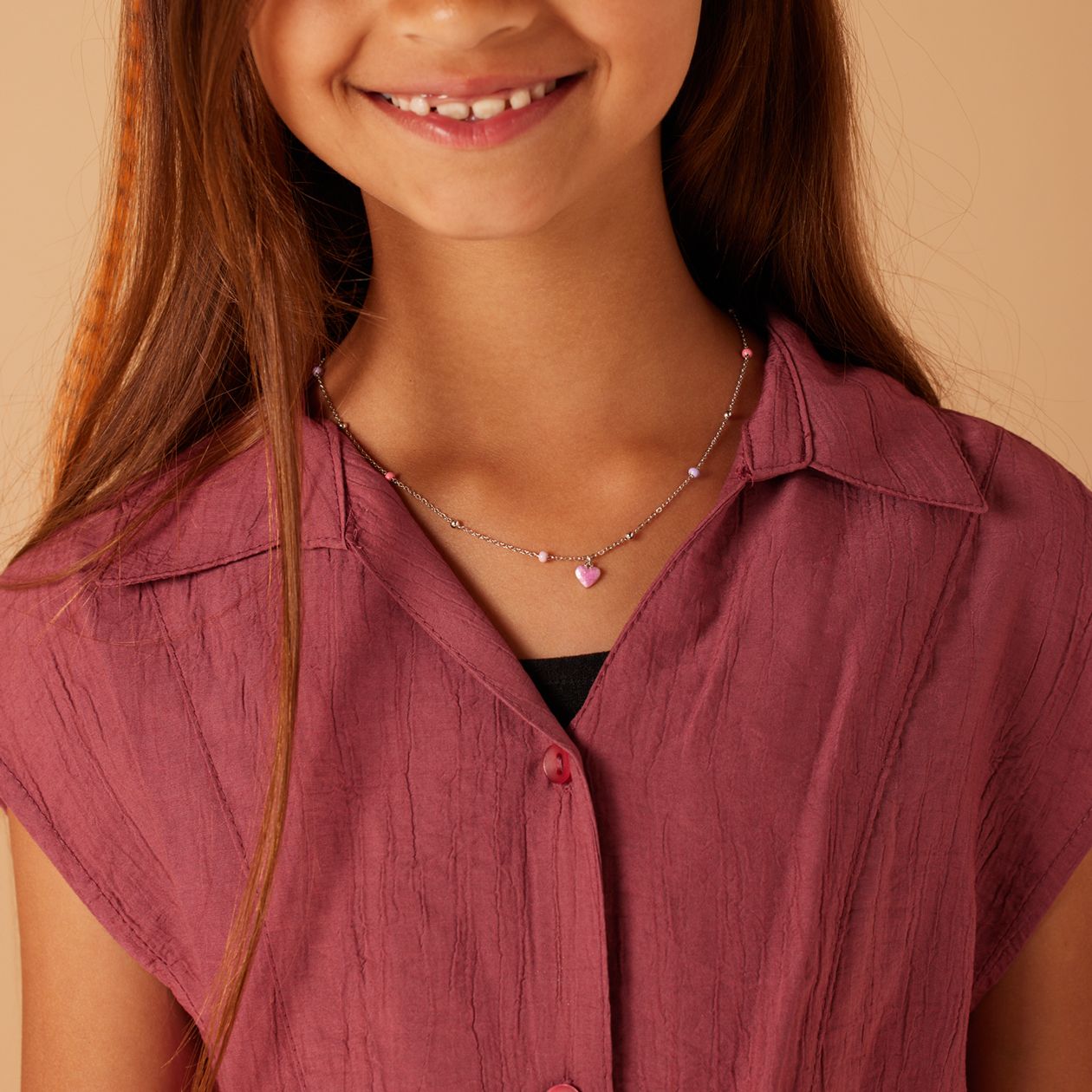 Zilveren collier met roze hartje