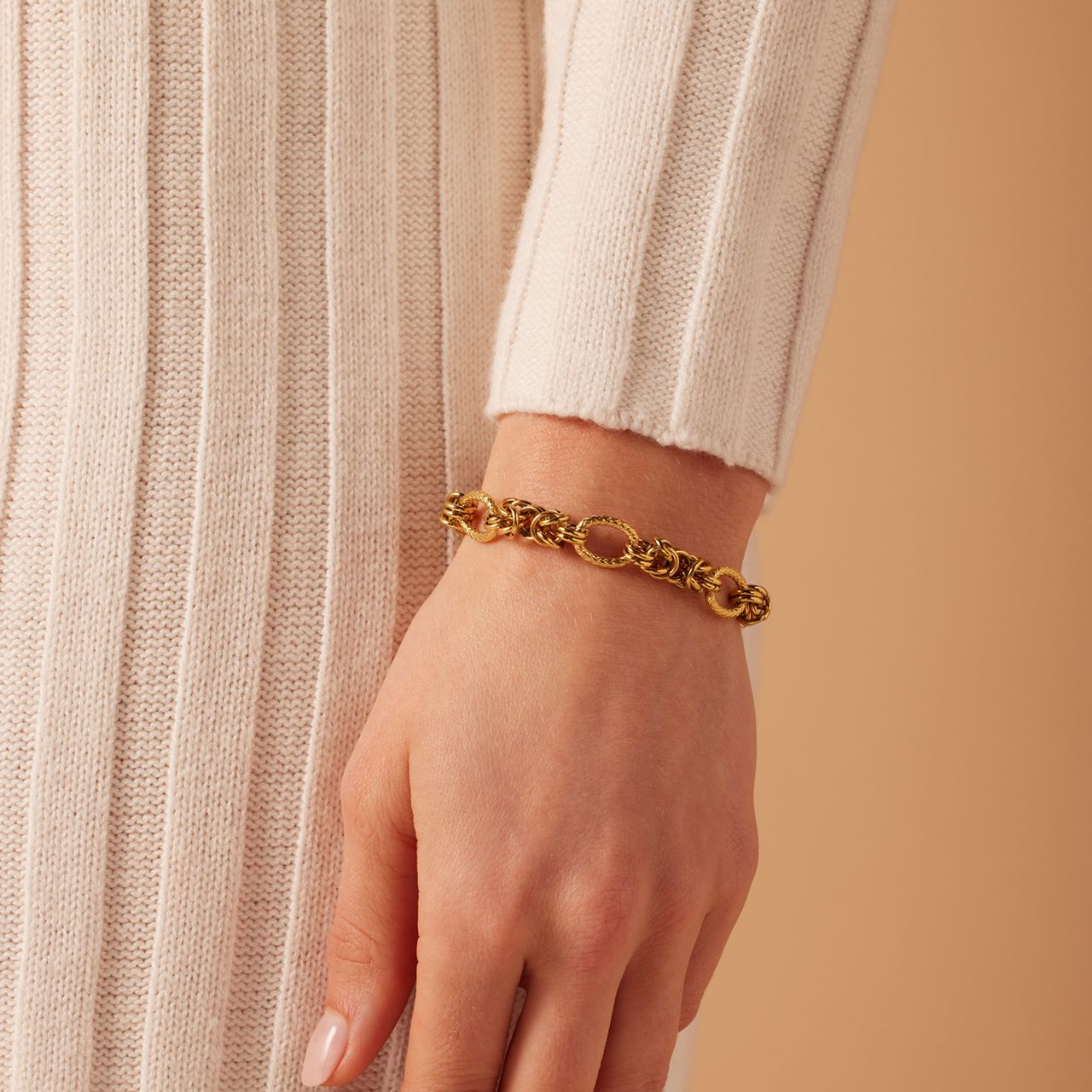 Stainless steel goldplated armband met bewerking