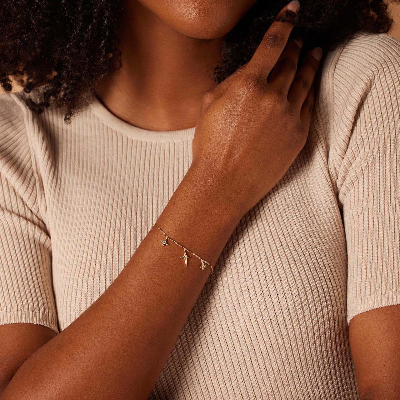 Zilveren goldplated armband met hangers sterren zirkonia