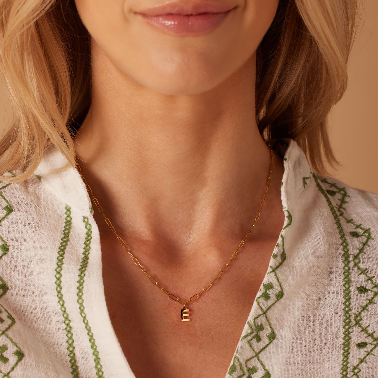 Stainless steel goldplated ketting met hanger letter E voor dames