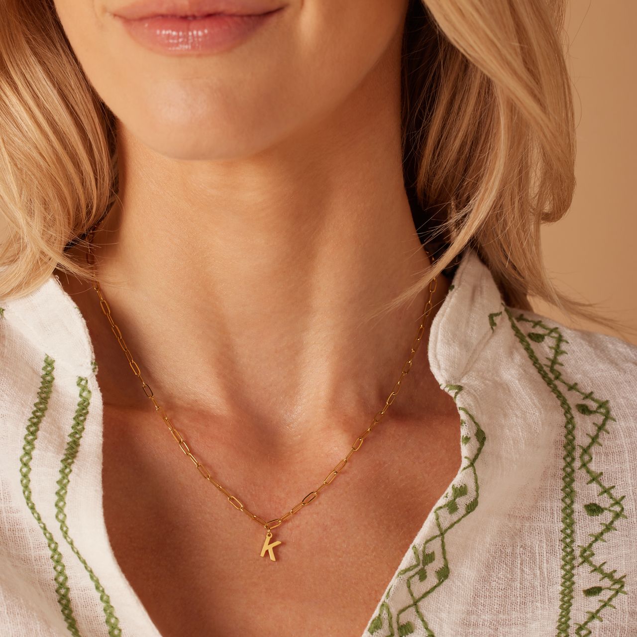 Stalen goldplated ketting closed forever letter K