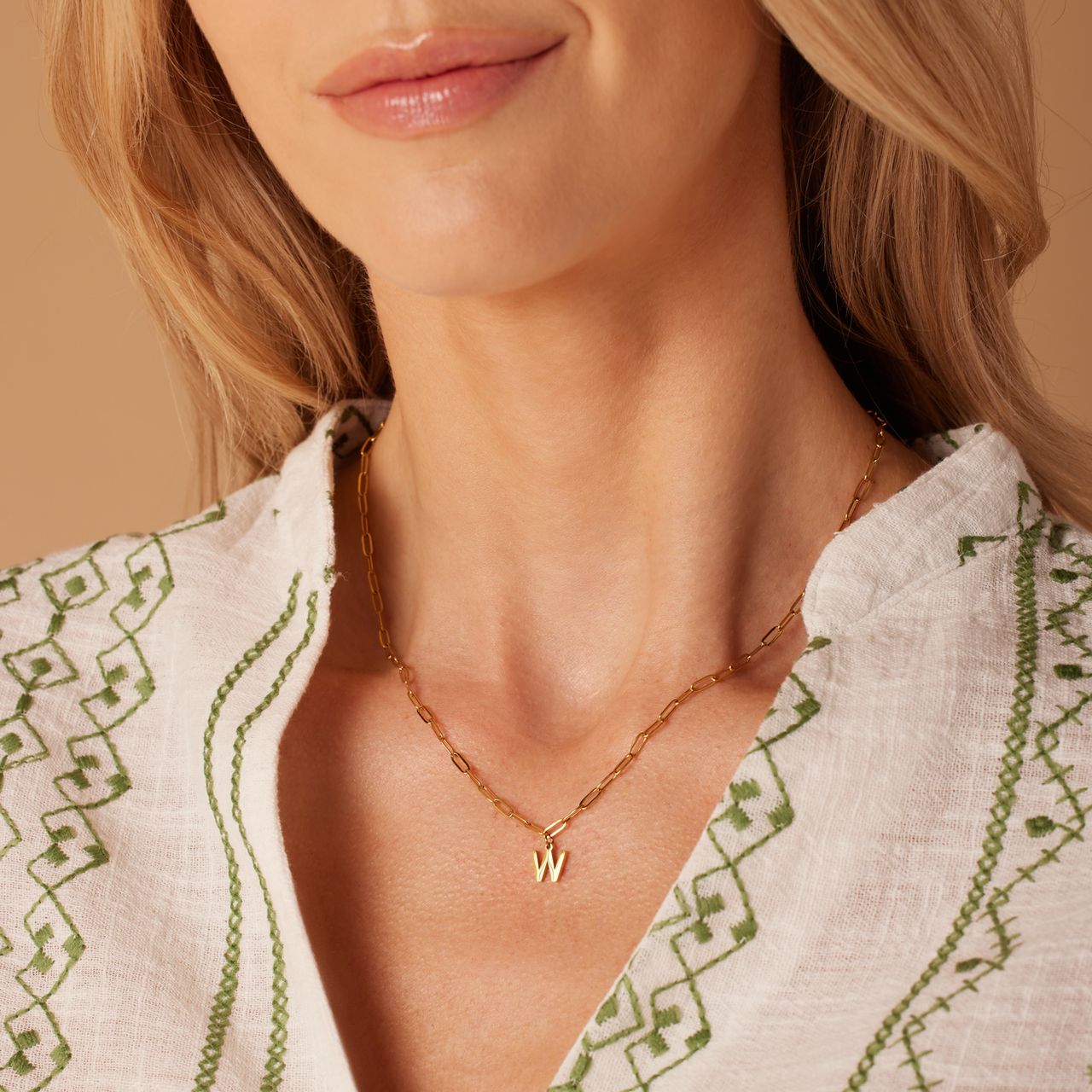 Stainless steel goldplated ketting closed forever letter W