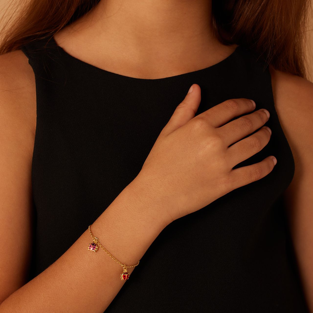 Zilveren goldplated kinderarmband kever