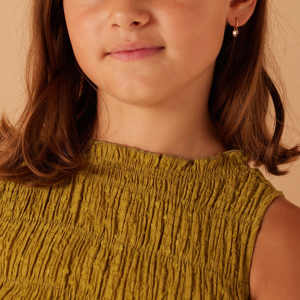 Zilveren goldplated kinderoorringen hart met zirkonia