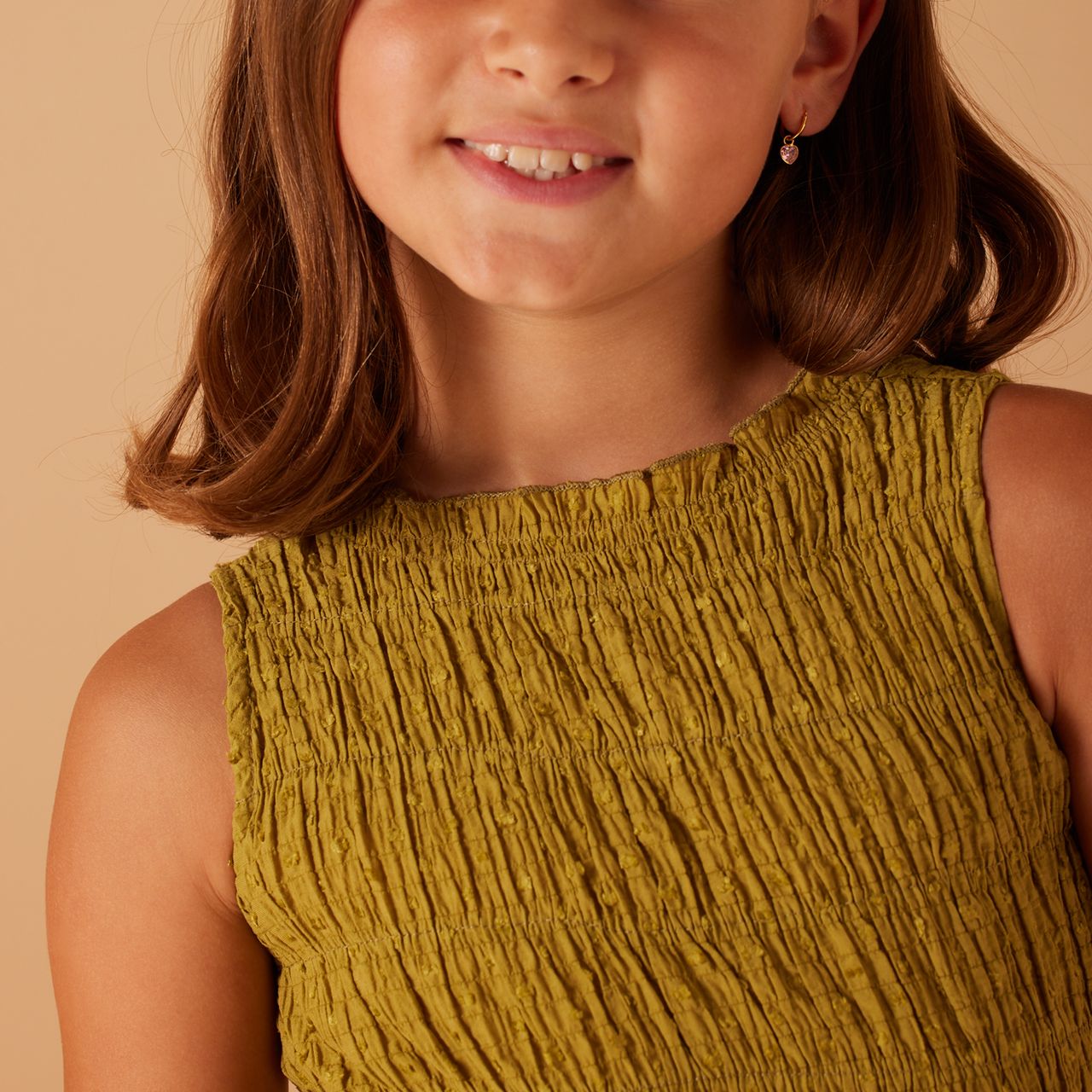 Zilveren goldplated kinderoorringen hart met zirkonia