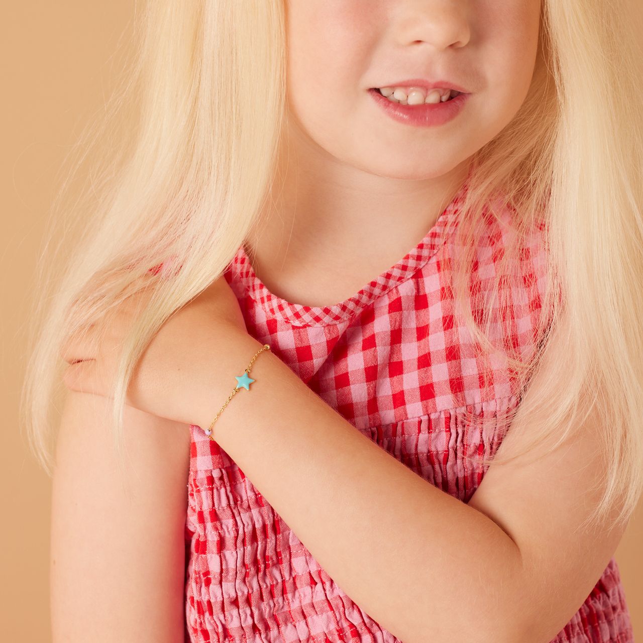 Zilveren goldplated kinderbedelarmband met ster met emaille 