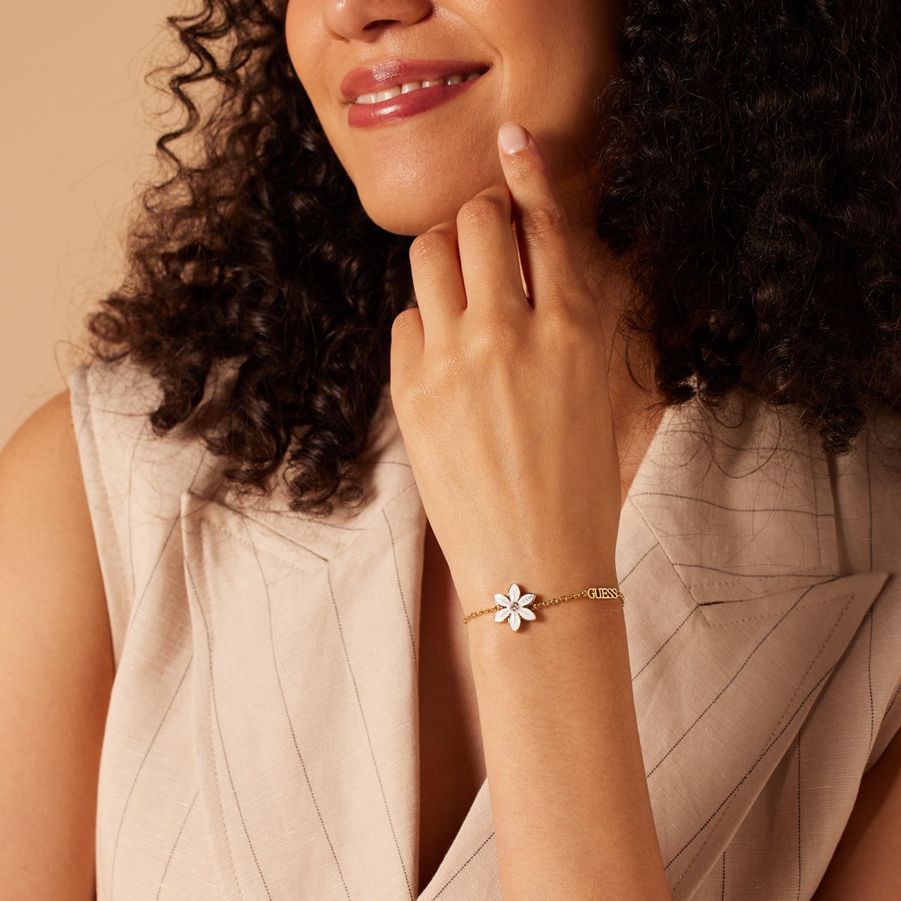 Guess stalen goldplated armband WHITE LOTUS