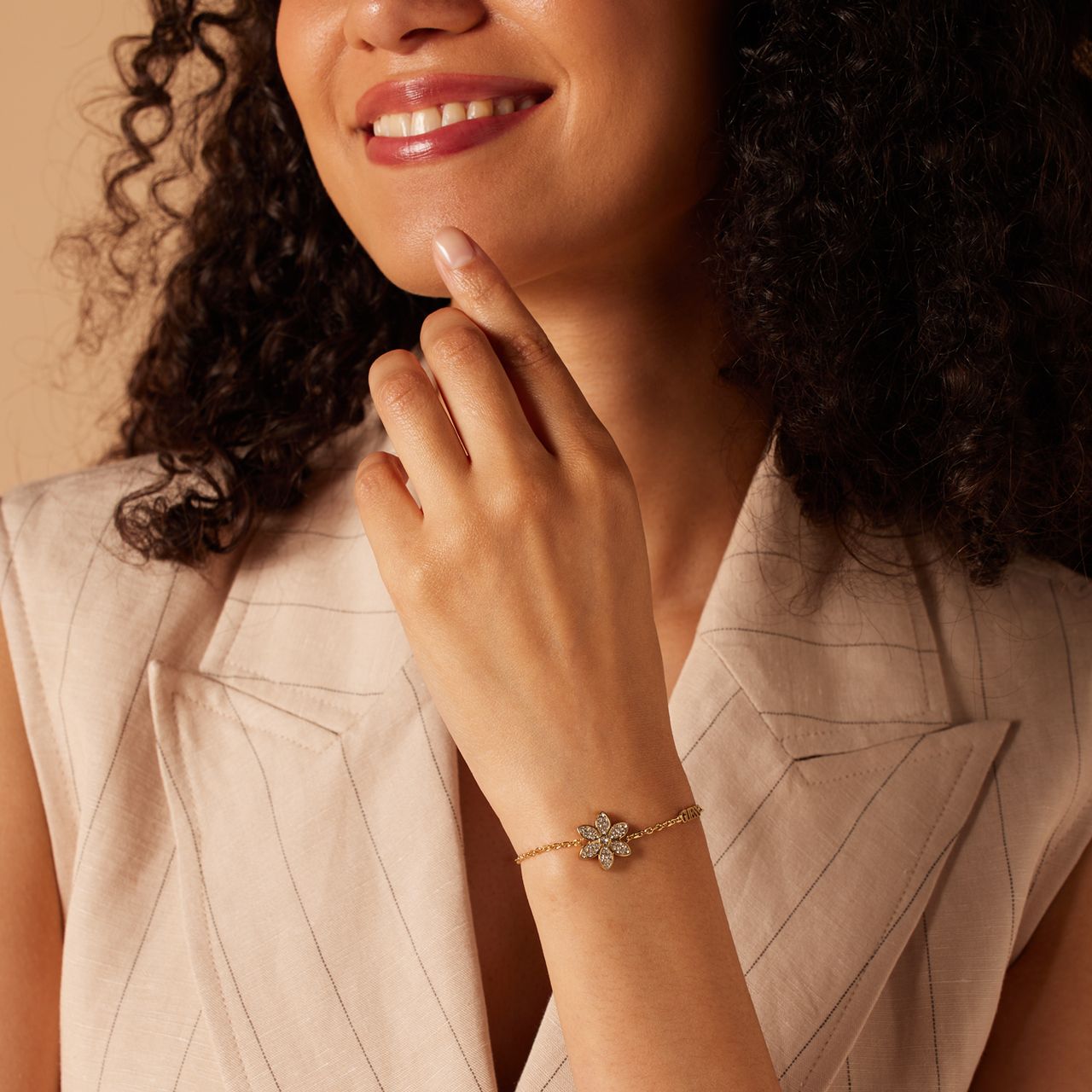 Guess stainless steel goldplated armband WHITE LOTUS