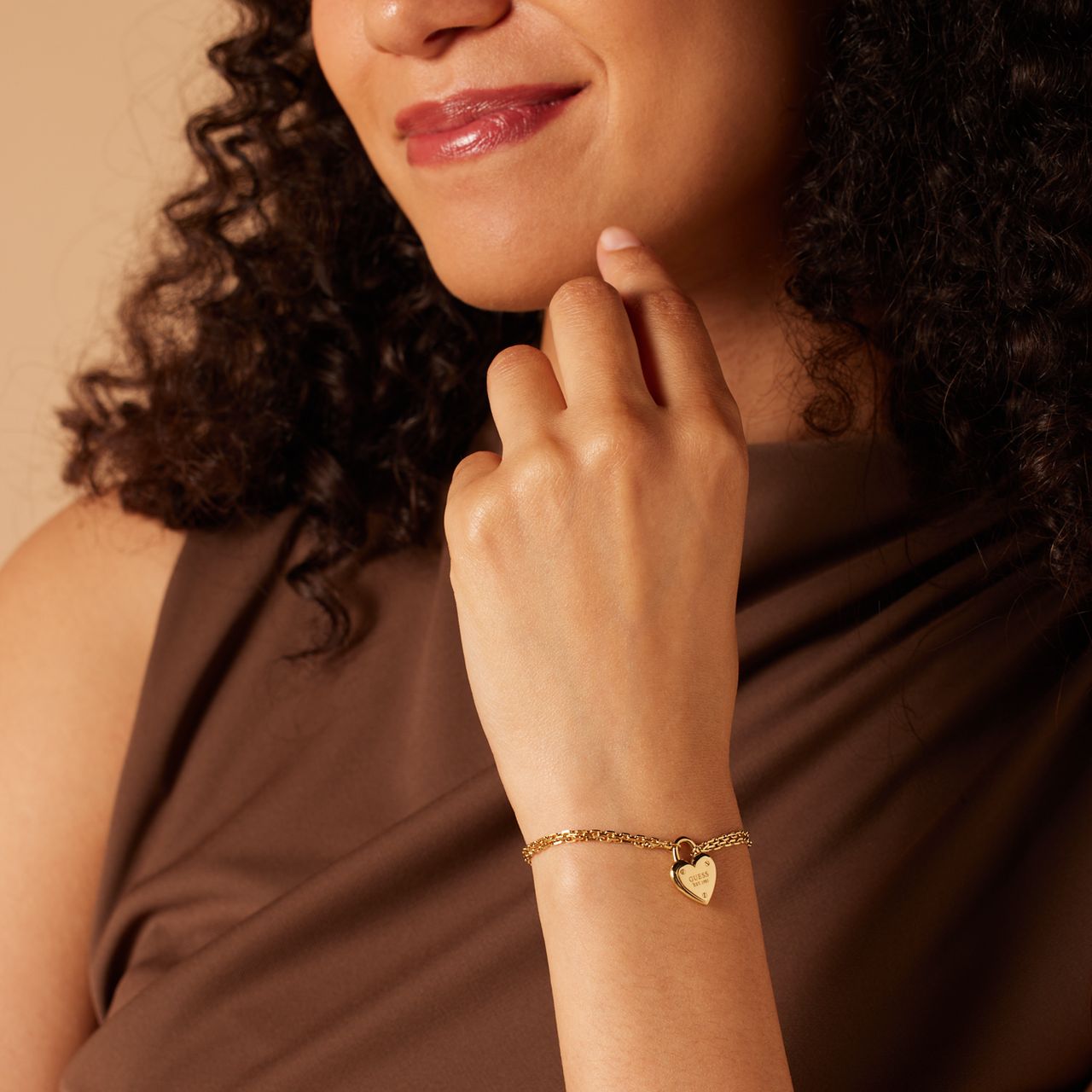 Guess stainless steel goldplated fantasiearmband voor dames