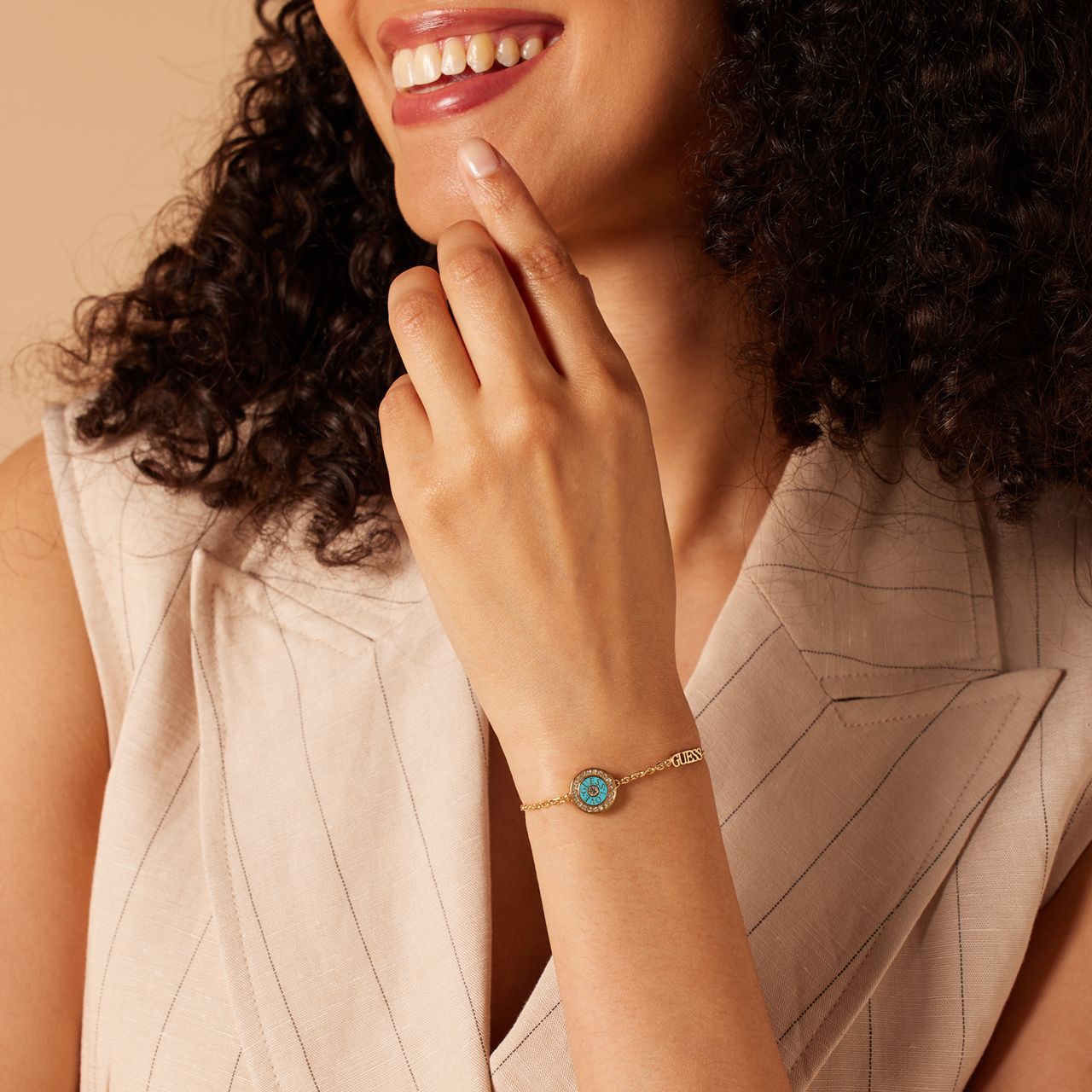 Guess stainless steel goldplated fantasiearmband met zirkonia voor dames