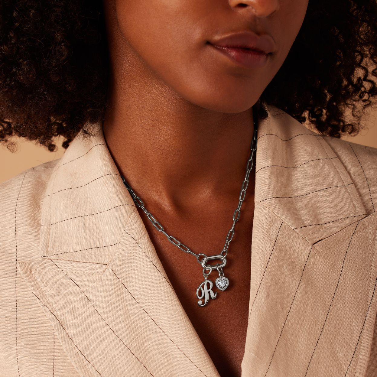 Stainless steel bedel open hart met zirk