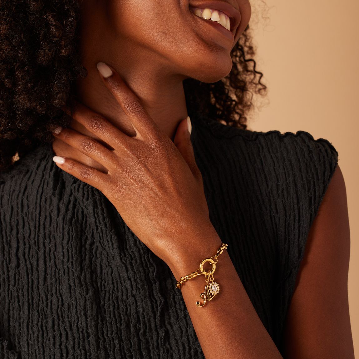 Stainless steel goldplated bedel open ovaal met zirk
