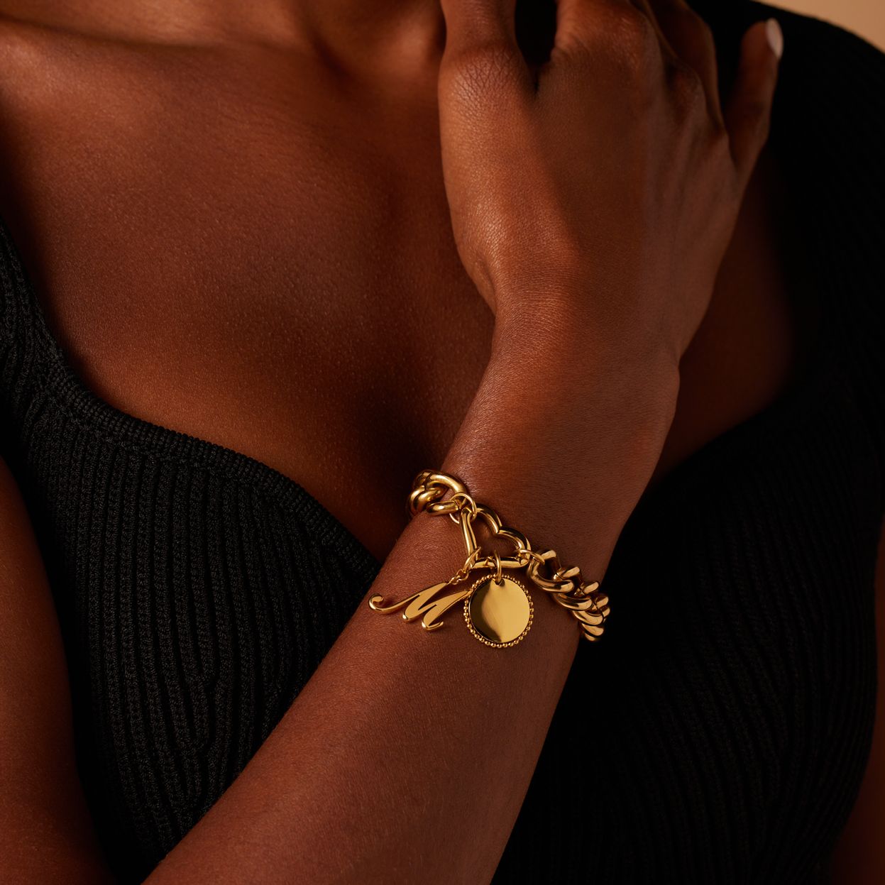 Stalen goldplated bedel letter