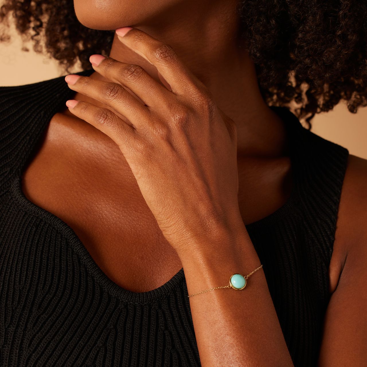 Stainless steel goldplated fantasiearmband met turquoise voor dames