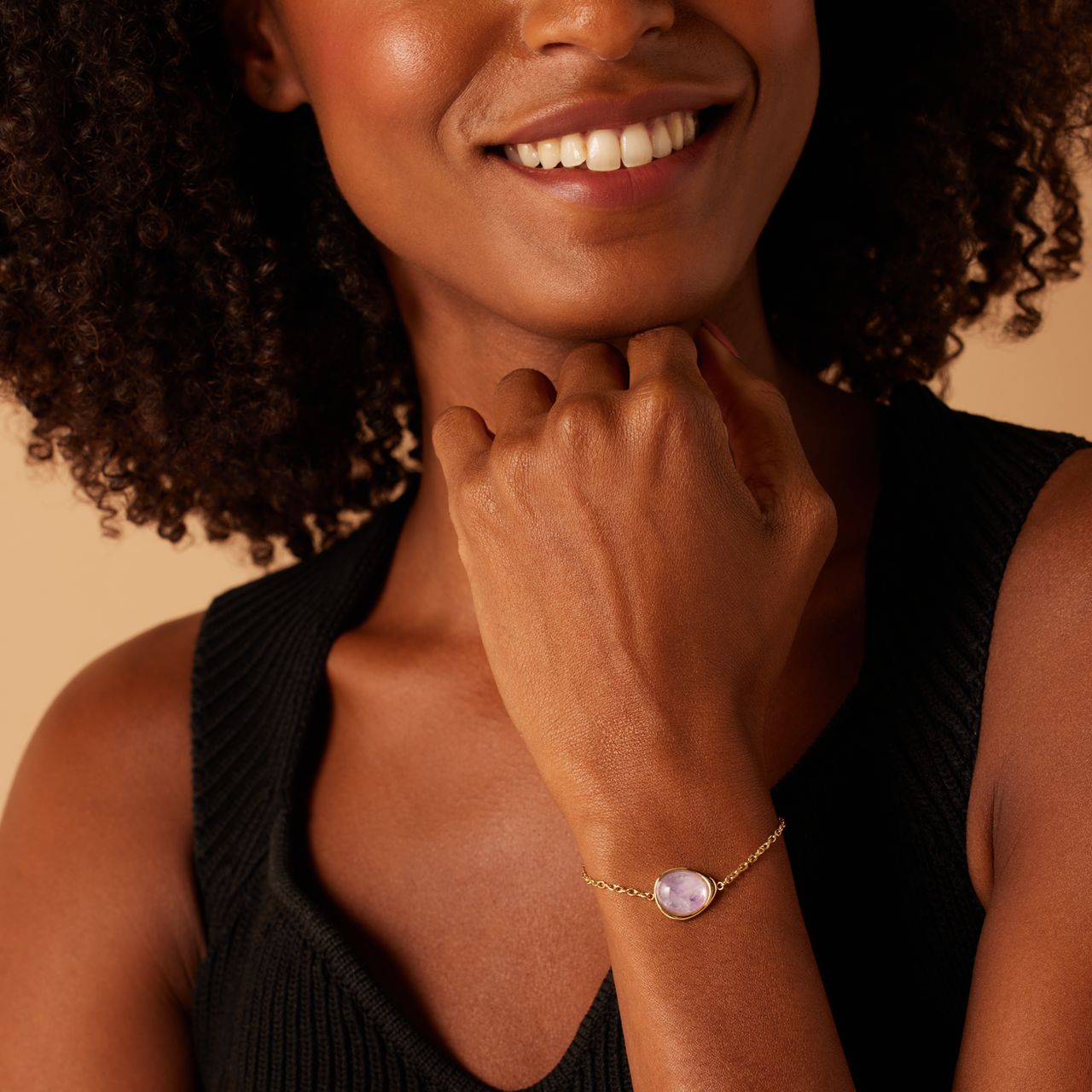 Stainless steel goldplated armband met amethyst ovaal