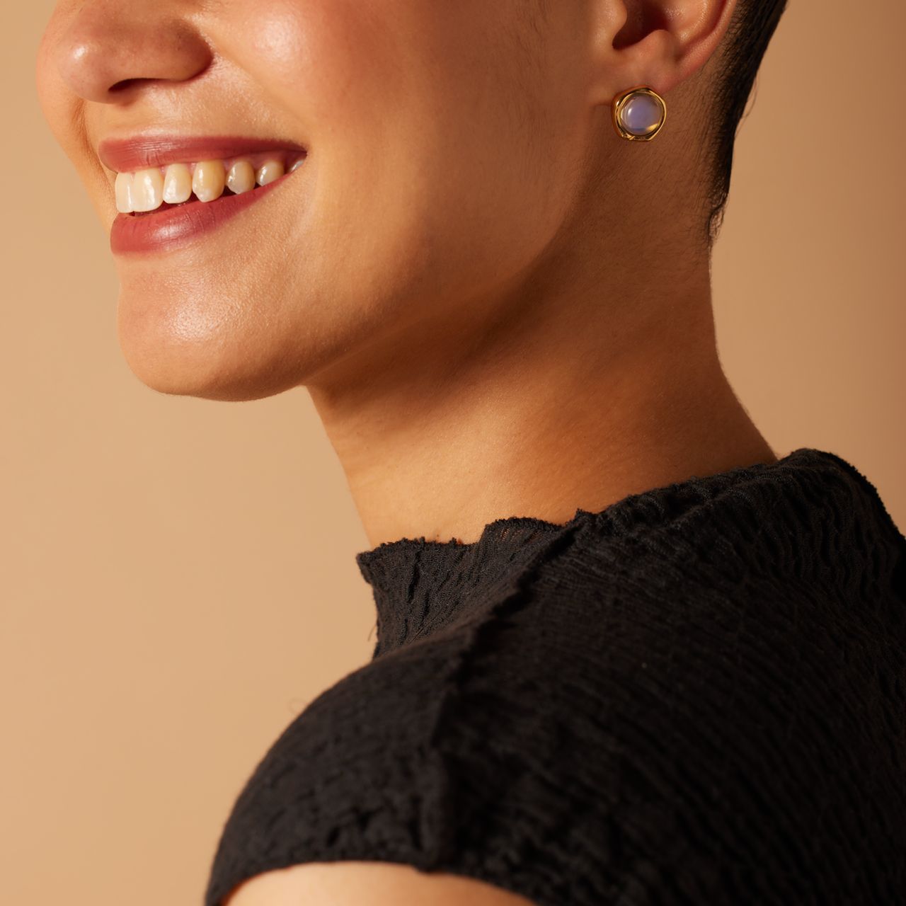 Stainless steel goldplated oorknoppen met opaal voor dames