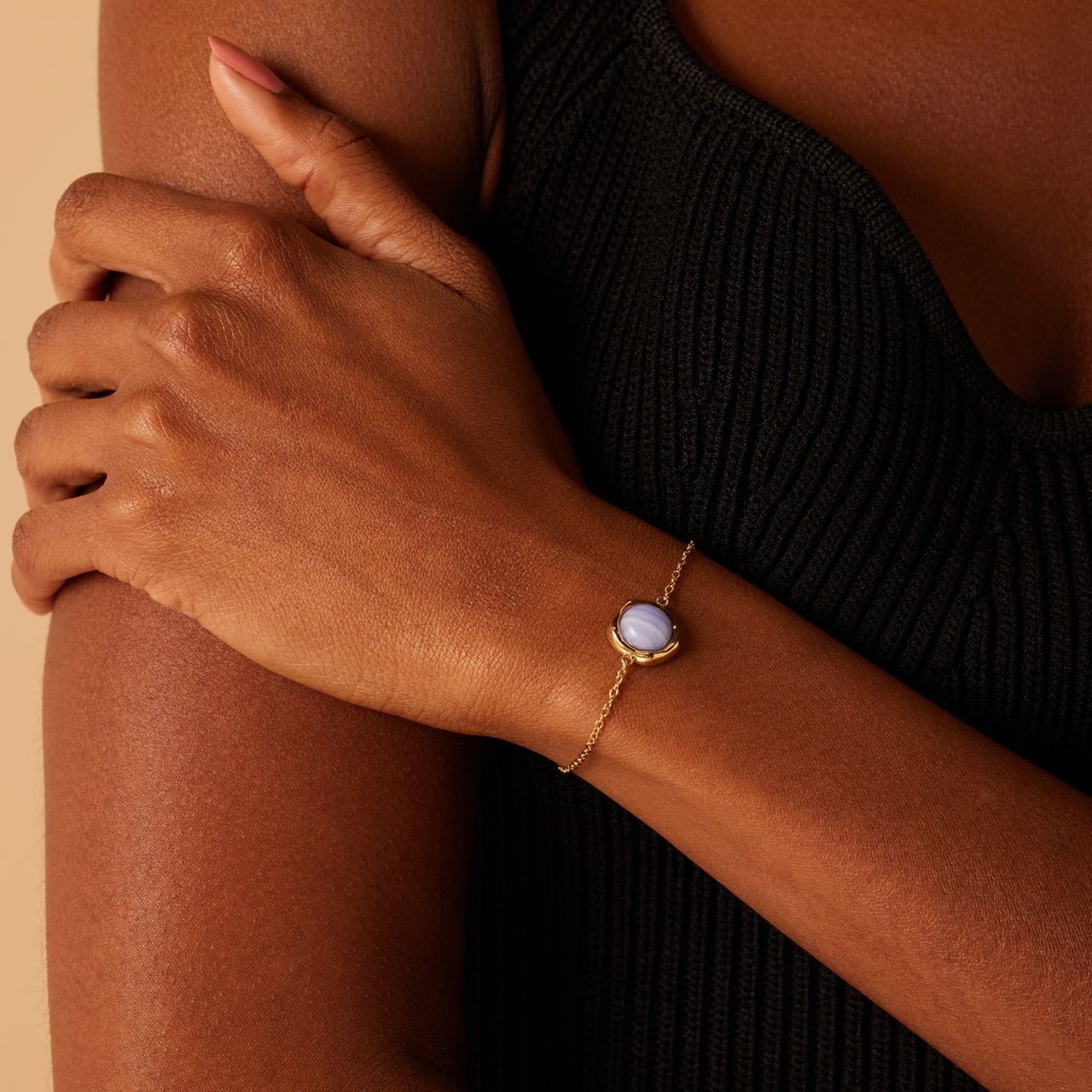 Stainless steel goldplated armband met blue lace