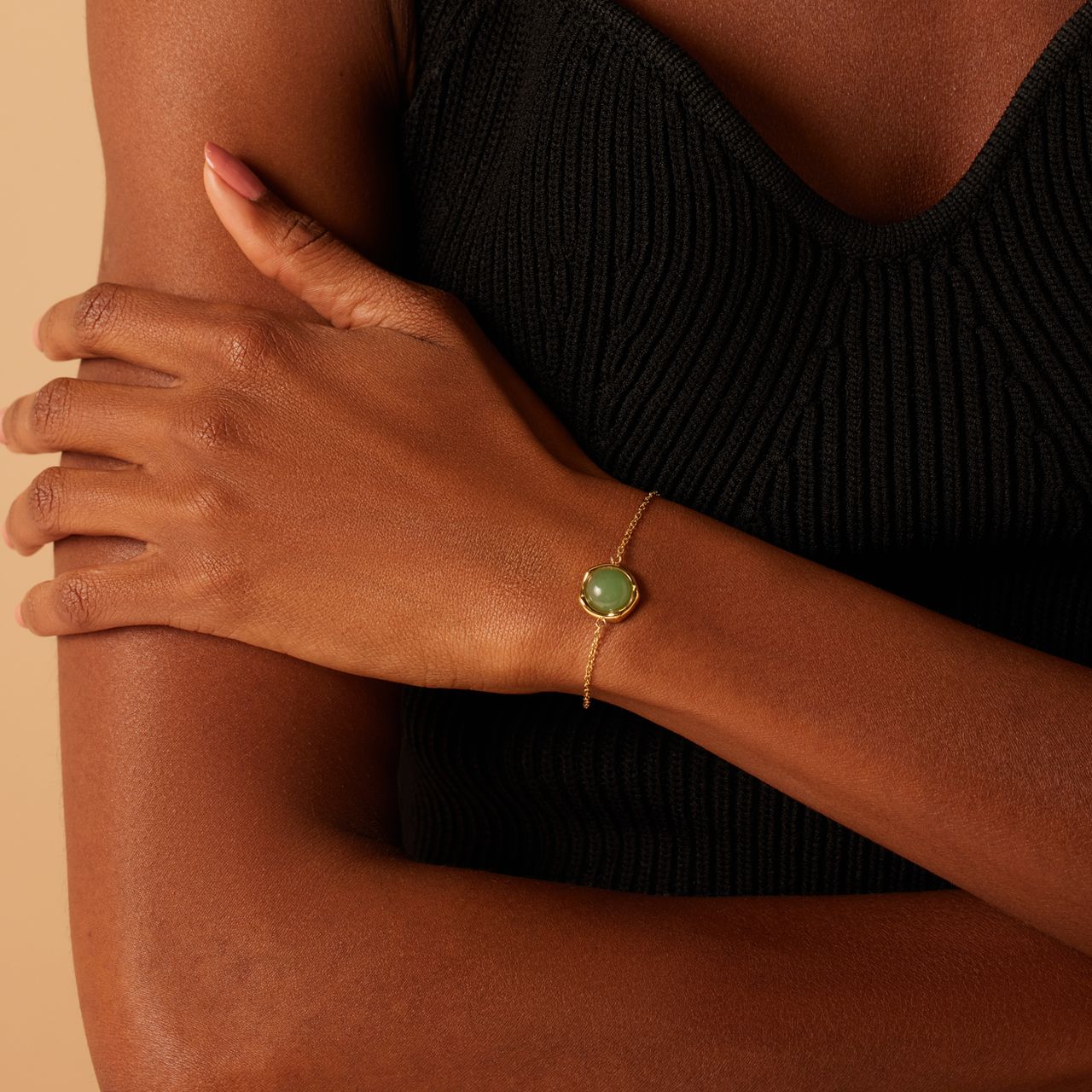 Stainless steel goldplated fantasiearmband met groene aventurijn voor dames