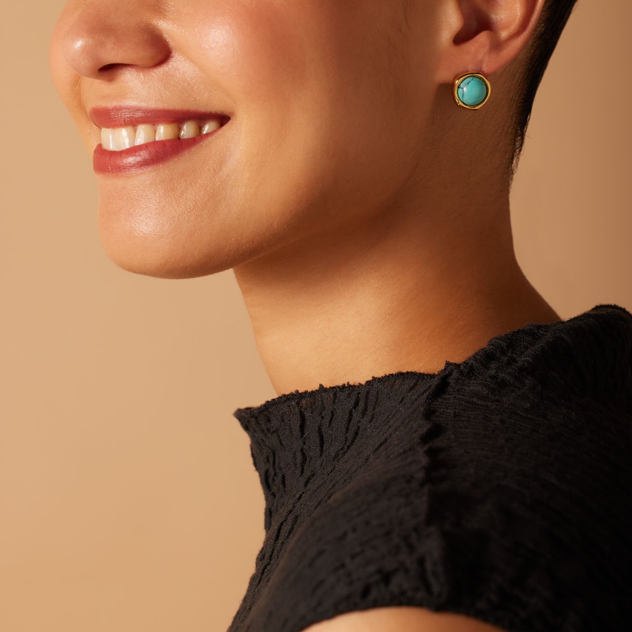 Stainless steel goldplated oorknoppen met turquoise voor dames