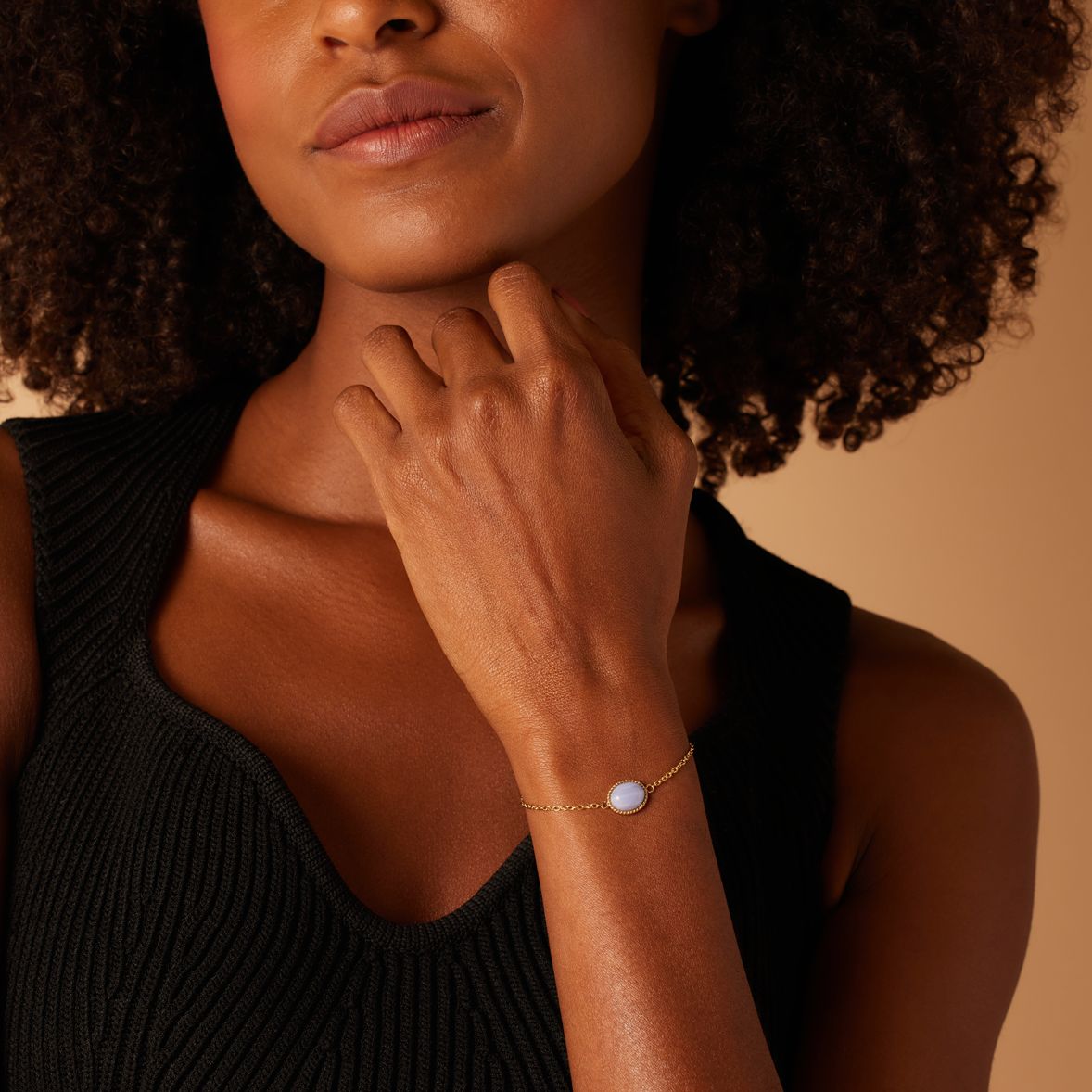 Stainless steel goldplated armband met blue lace
