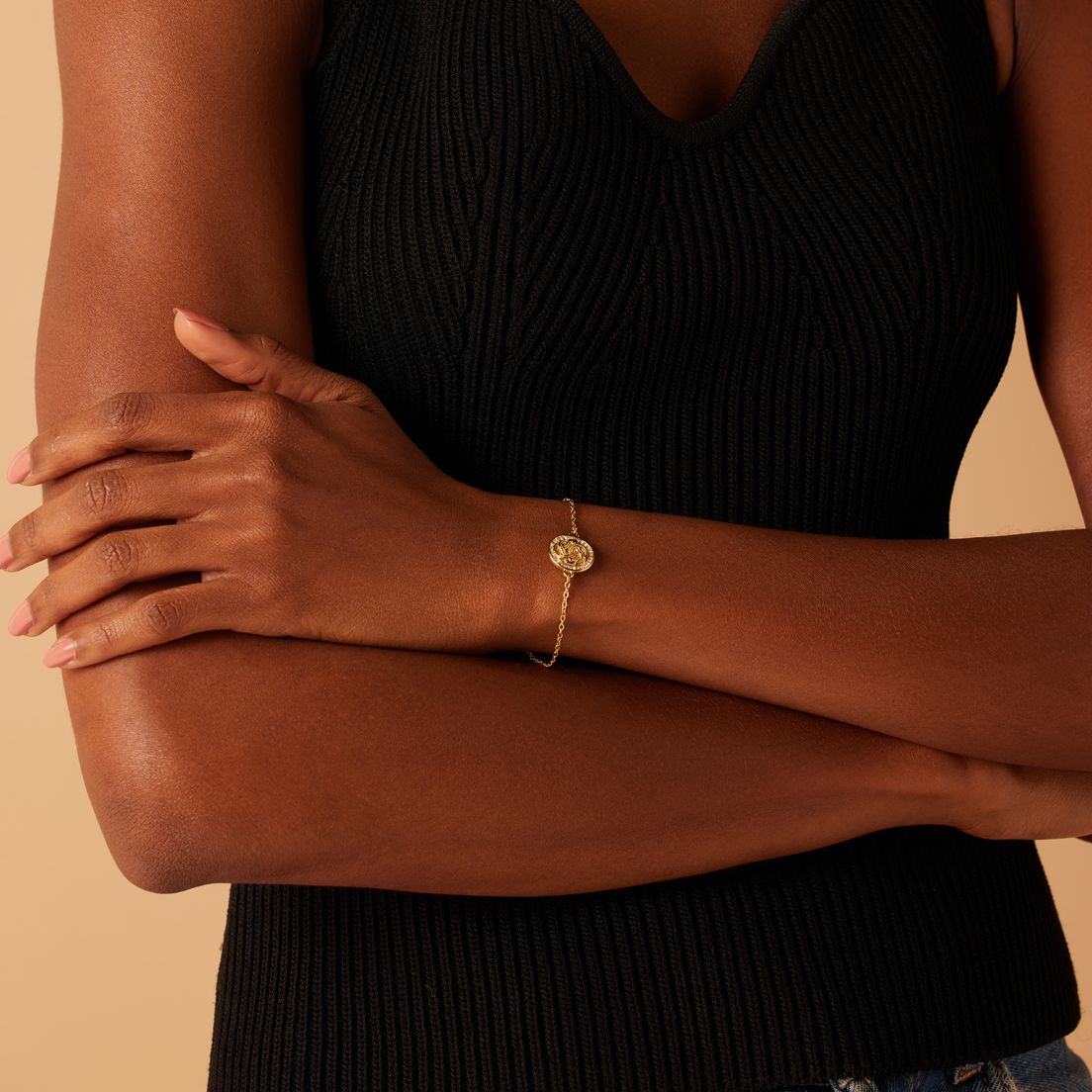 Stalen goldplated armband met mattenklopper