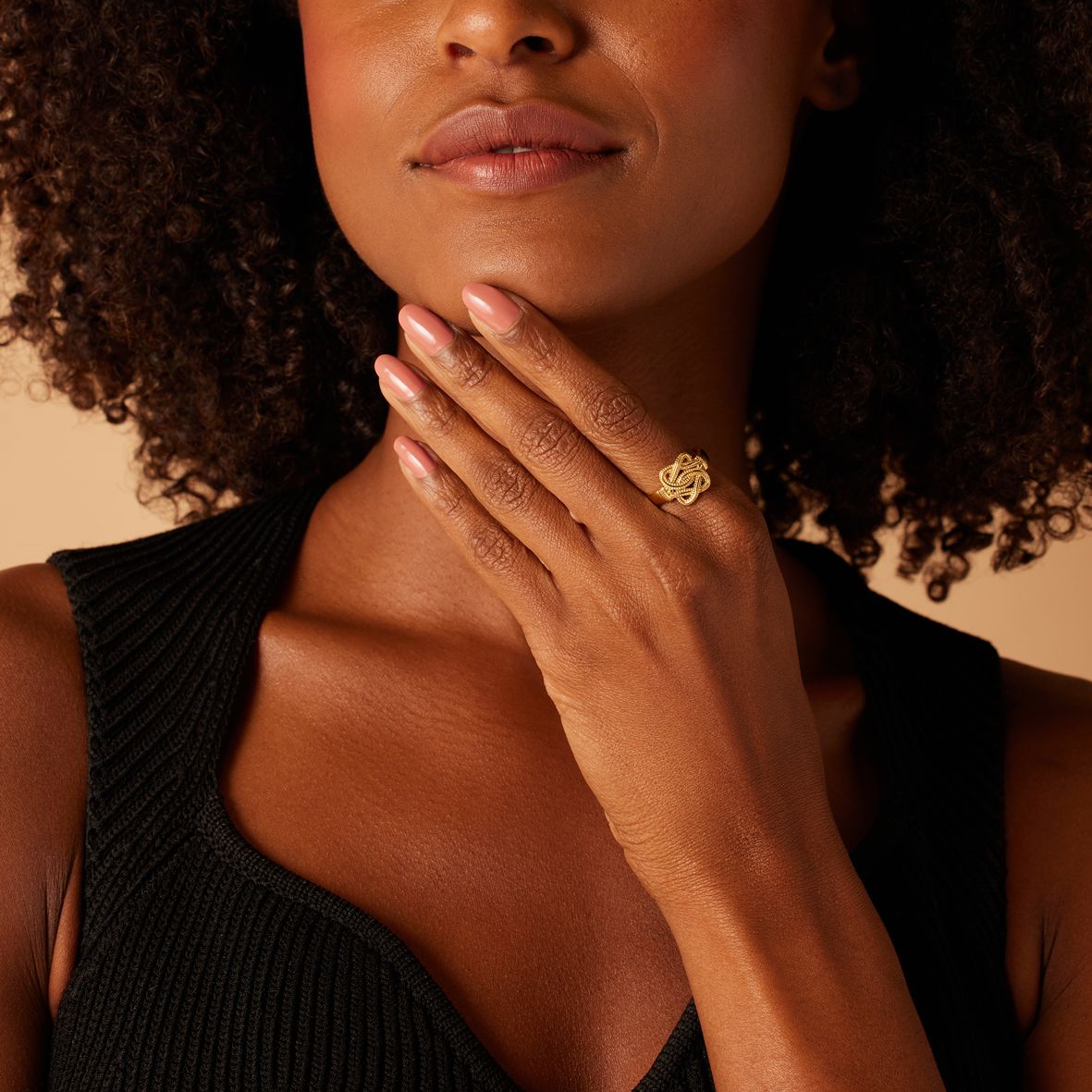 Stalen goldplated ring met surinaamse mattenklopper