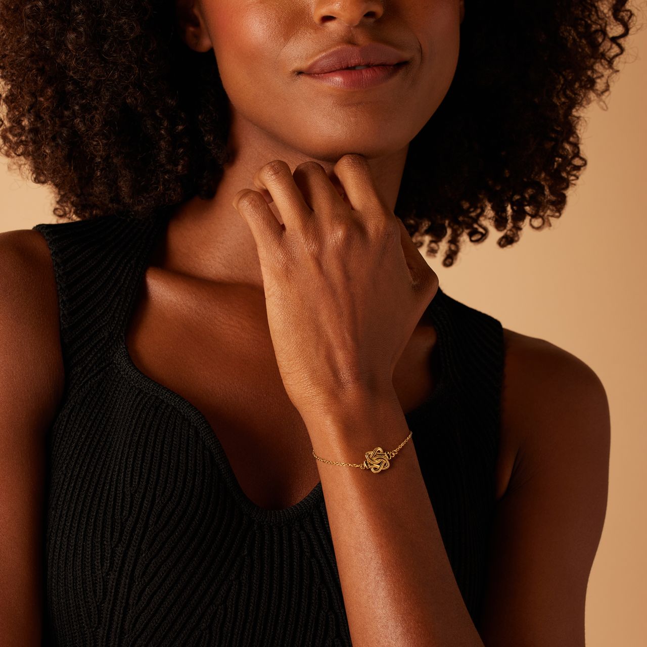 Stalen goldplated fantasiearmband met mattenklopper voor dames