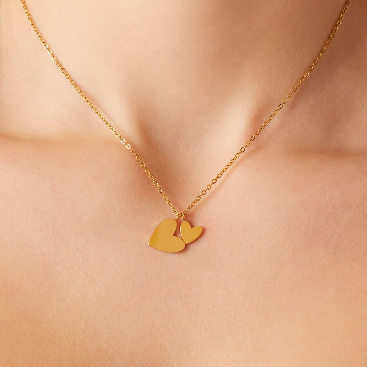 Stainless steel goldplated ketting met 2 hartjes voor dames