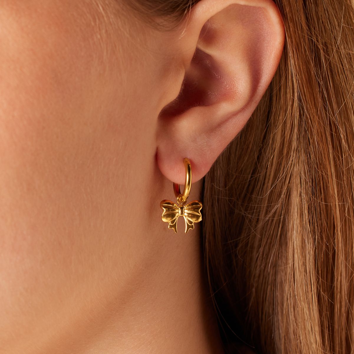 Stalen goldplated oorringen strik voor dames