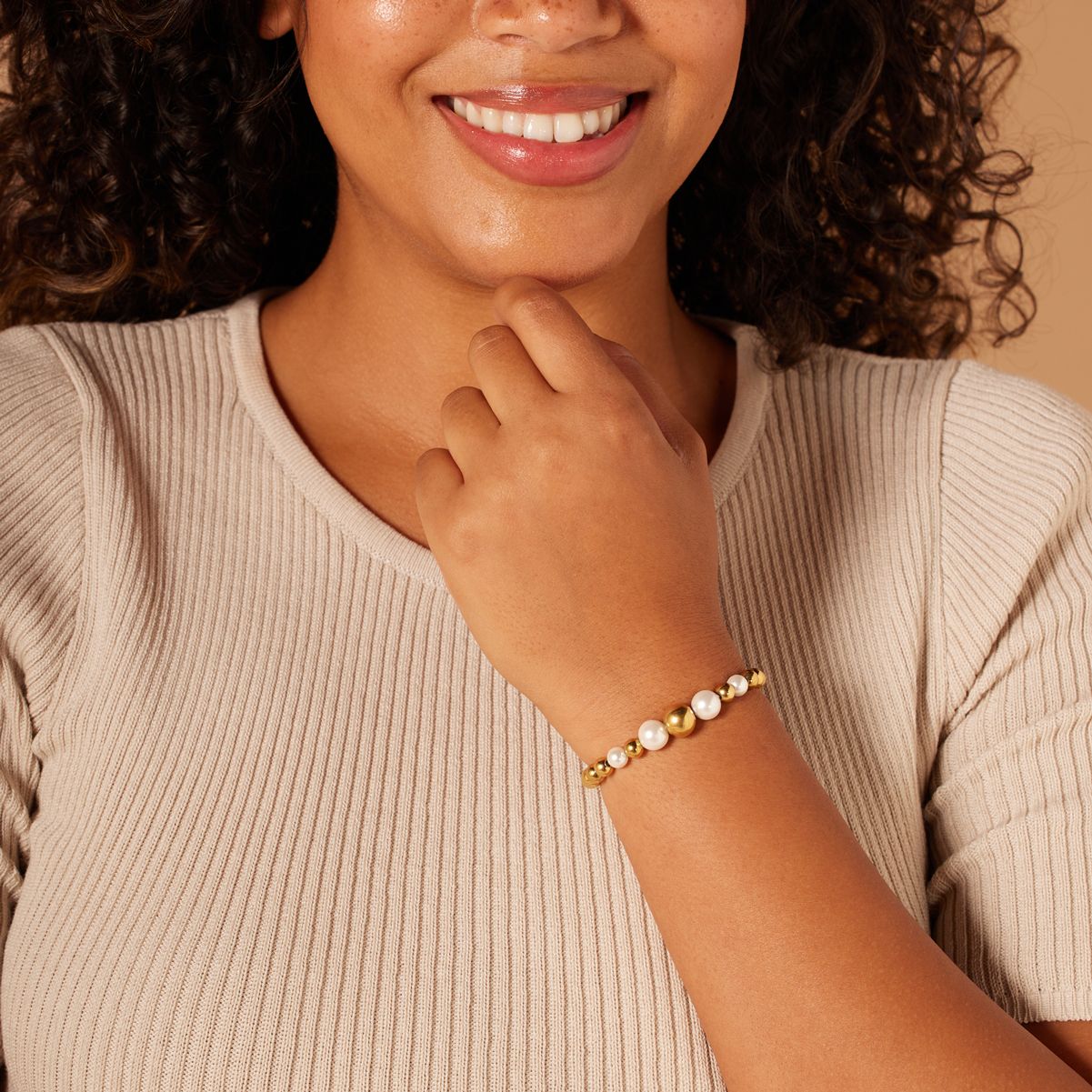 Stainless steel goldplated kralenarmband met parel voor dames