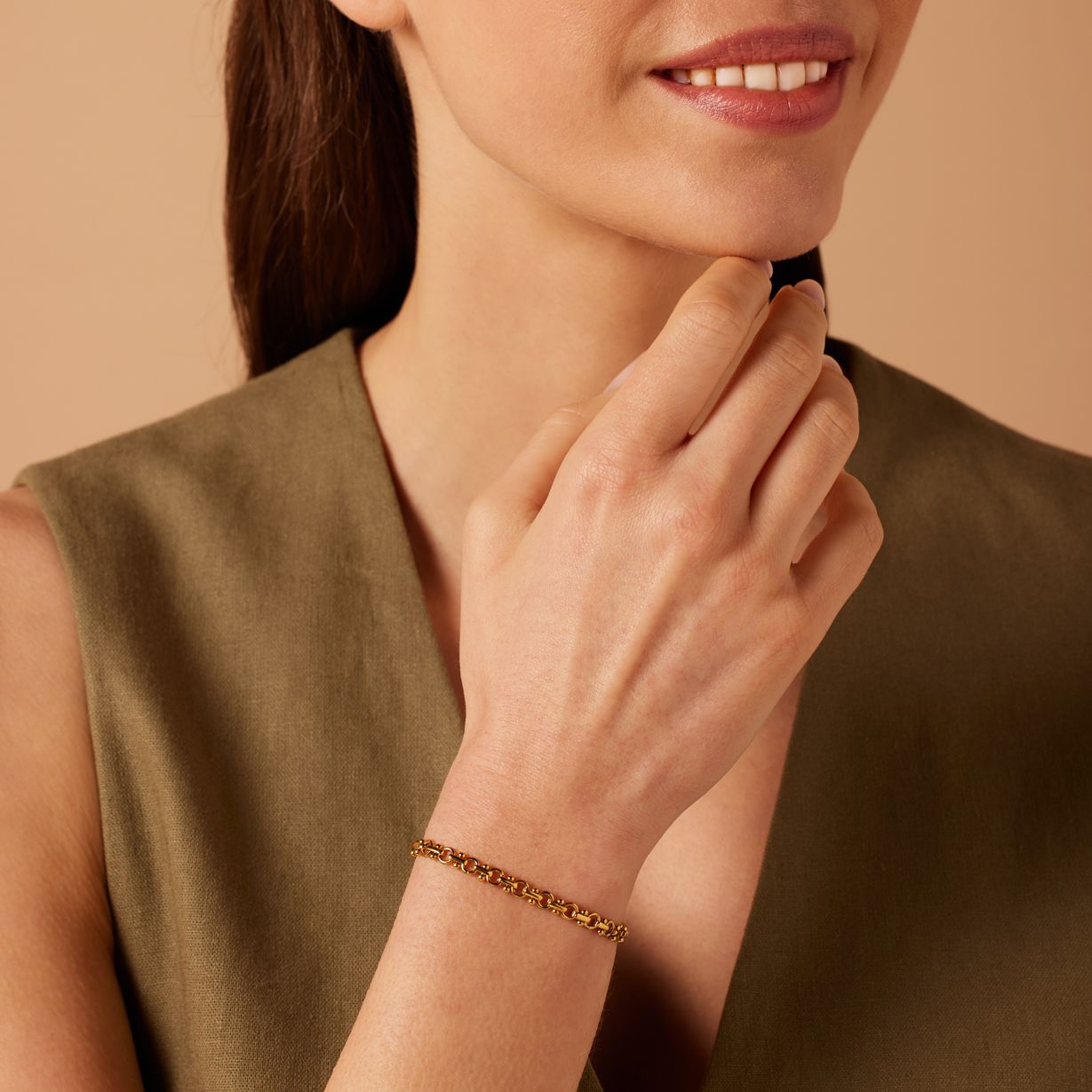 Stainless steel goldplated schakelarmband voor dames