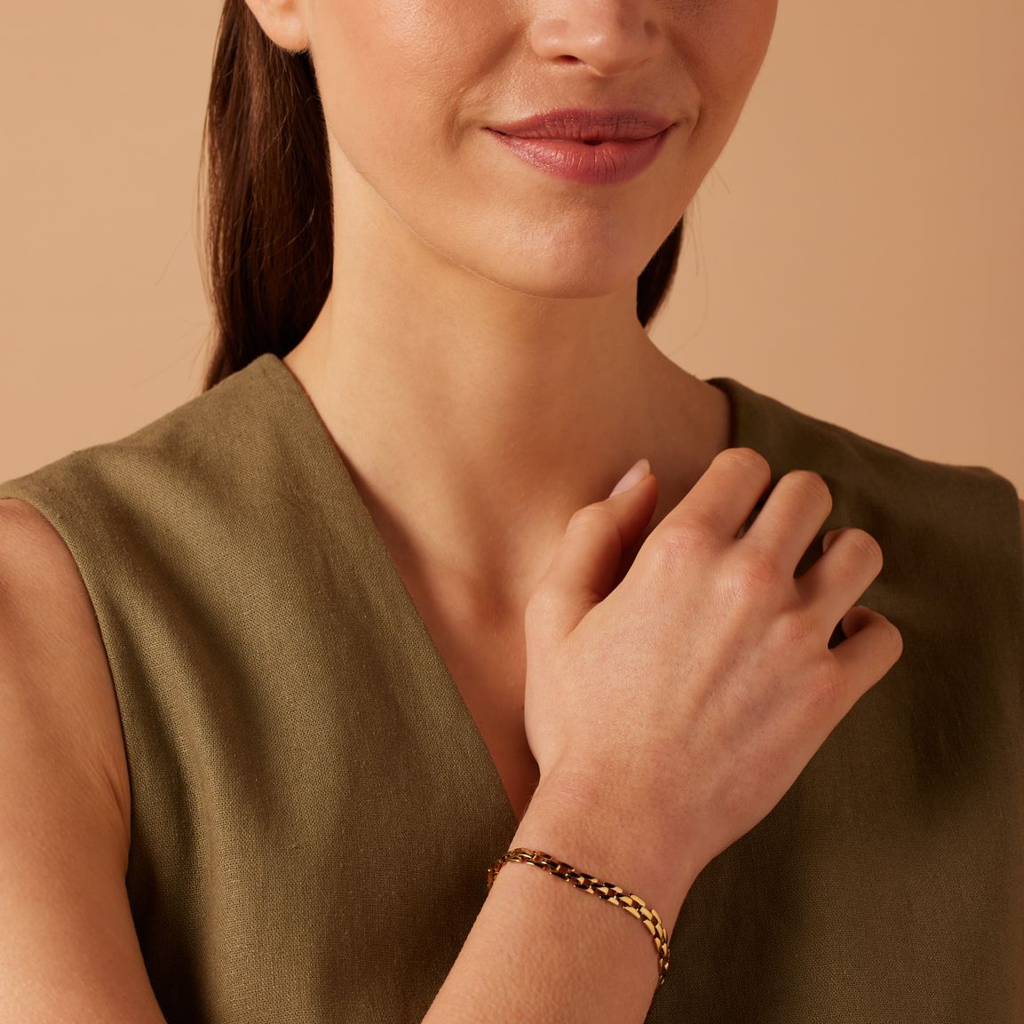 Stainless steel goldplated schakelarmband voor dames