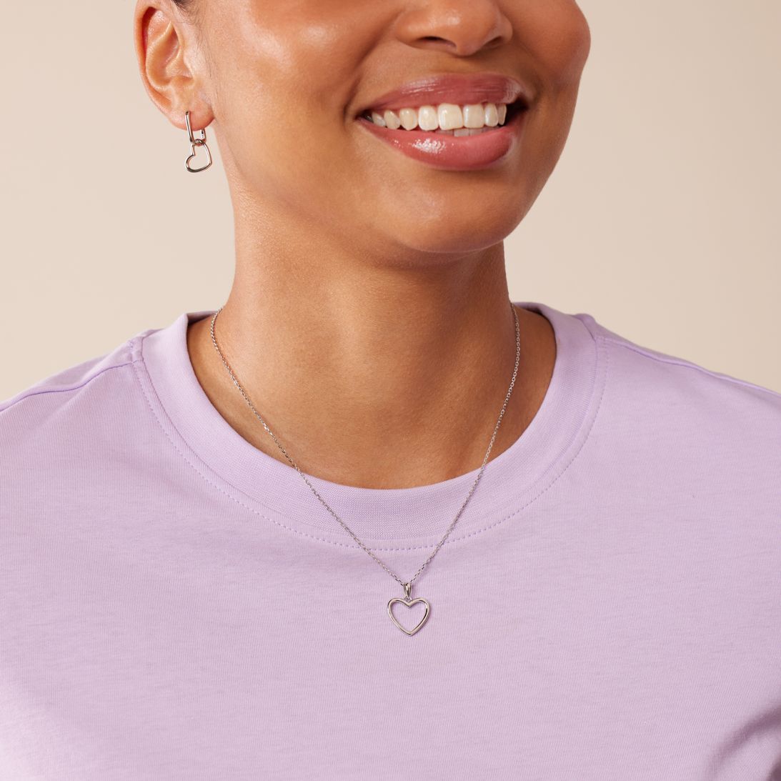 Zilveren ketting met hanger en oorbellen