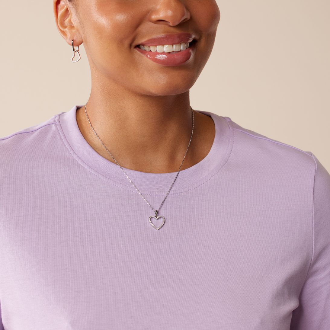 Zilveren ketting met hanger en oorbellen met zirkonia