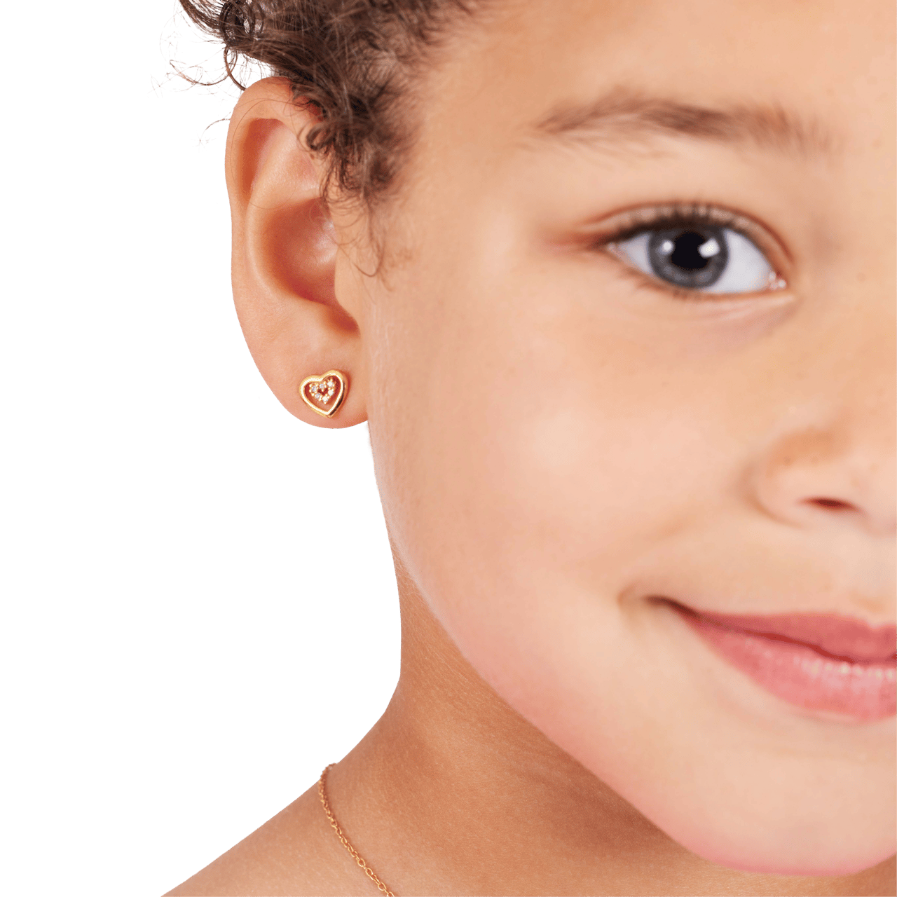 Zilveren goldplated kinderoorknoppen hart met zirkonia